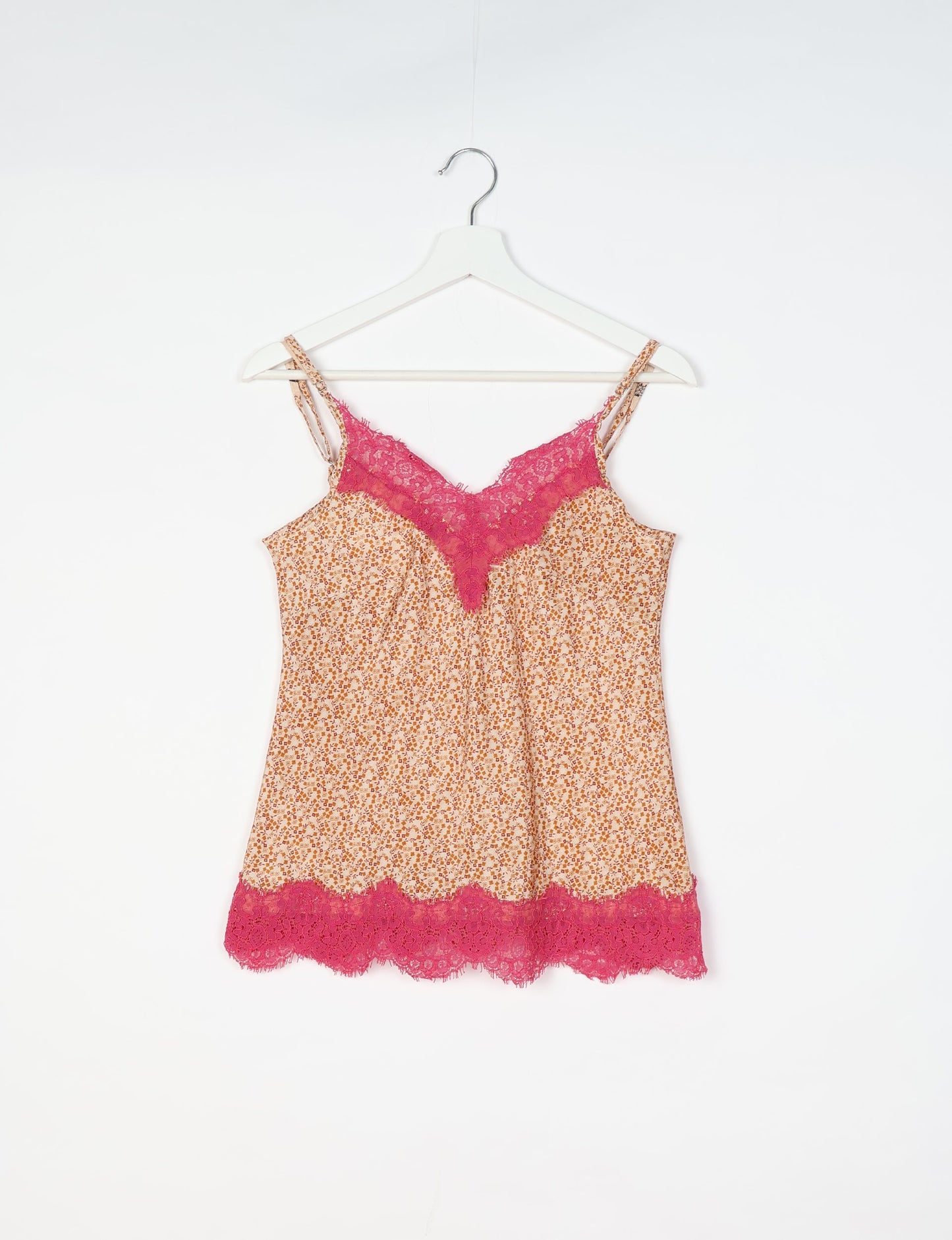 Sleep in eco-friendly luxury with our PJ Set Short. Made for the conscious consumer, these pajamas contribute to zero waste and sustainable practices. The cami top, adorned with delicate eyelash lace and cut on the bias, pairs seamlessly with the comfy shorts featuring an elasticated waist and drawstring tie.