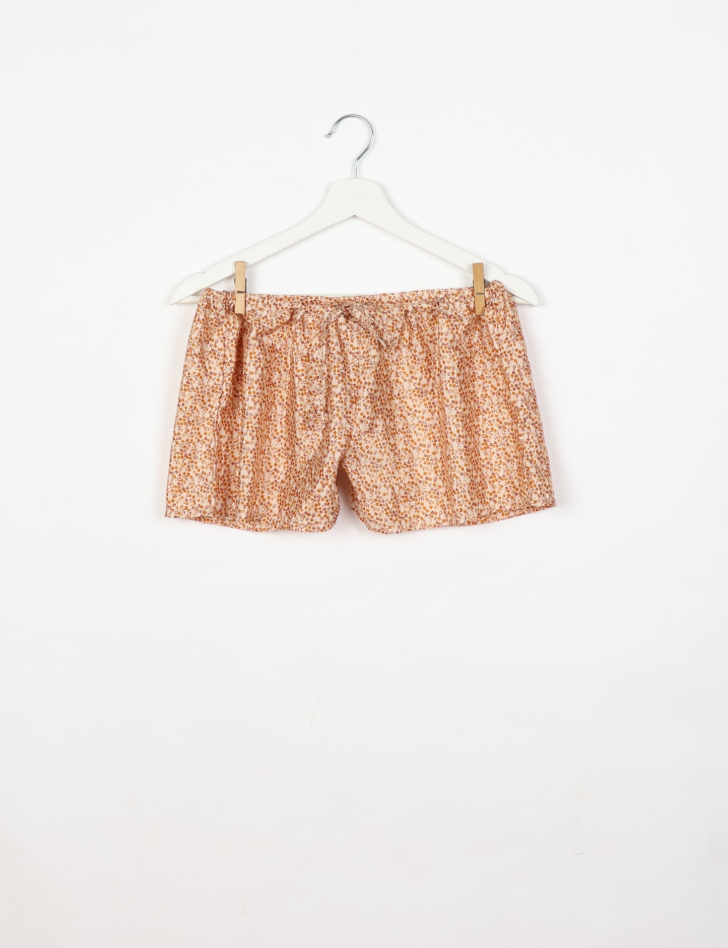 Sleep in eco-friendly luxury with our PJ Set Short. Made for the conscious consumer, these pajamas contribute to zero waste and sustainable practices. The cami top, adorned with delicate eyelash lace and cut on the bias, pairs seamlessly with the comfy shorts featuring an elasticated waist and drawstring tie.