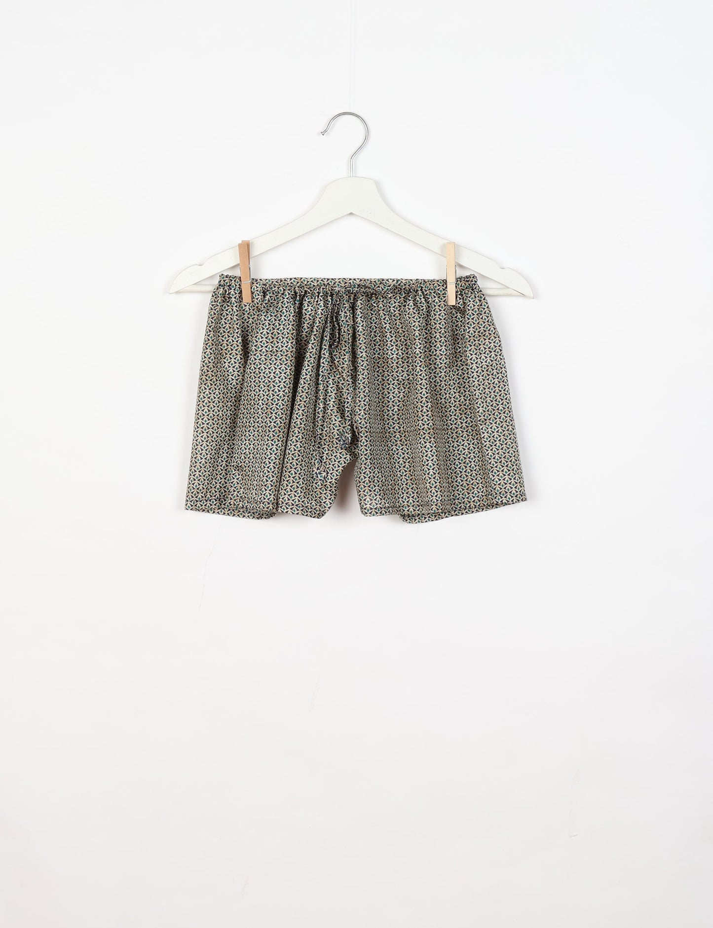 Sleep in eco-friendly luxury with our PJ Set Short. Made for the conscious consumer, these pajamas contribute to zero waste and sustainable practices. The cami top, adorned with delicate eyelash lace and cut on the bias, pairs seamlessly with the comfy shorts featuring an elasticated waist and drawstring tie.