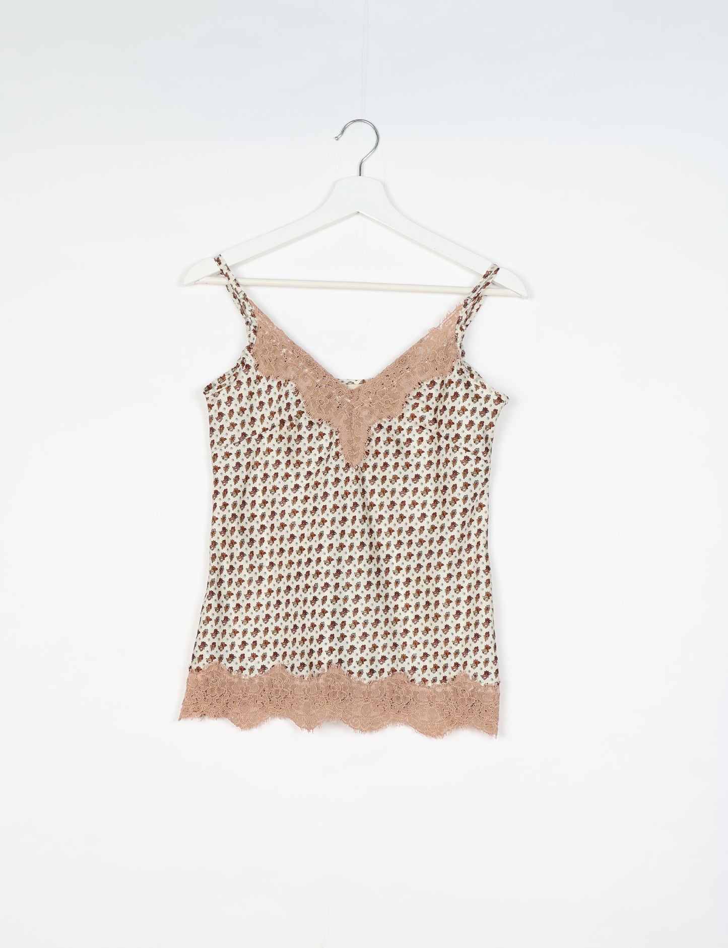 Sleep in eco-friendly luxury with our PJ Set Short. Made for the conscious consumer, these pajamas contribute to zero waste and sustainable practices. The cami top, adorned with delicate eyelash lace and cut on the bias, pairs seamlessly with the comfy shorts featuring an elasticated waist and drawstring tie.