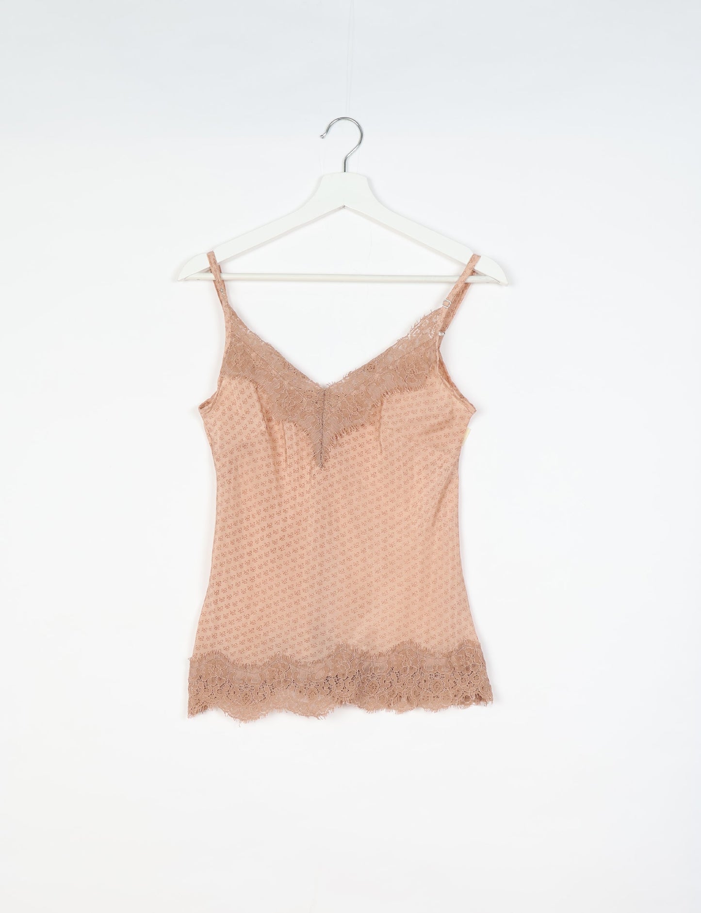 Sleep in eco-friendly luxury with our PJ Set Short. Made for the conscious consumer, these pajamas contribute to zero waste and sustainable practices. The cami top, adorned with delicate eyelash lace and cut on the bias, pairs seamlessly with the comfy shorts featuring an elasticated waist and drawstring tie.