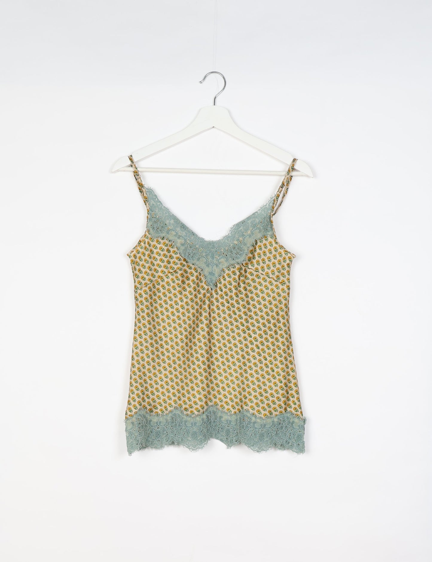 Sleep in eco-friendly luxury with our PJ Set Short. Made for the conscious consumer, these pajamas contribute to zero waste and sustainable practices. The cami top, adorned with delicate eyelash lace and cut on the bias, pairs seamlessly with the comfy shorts featuring an elasticated waist and drawstring tie.