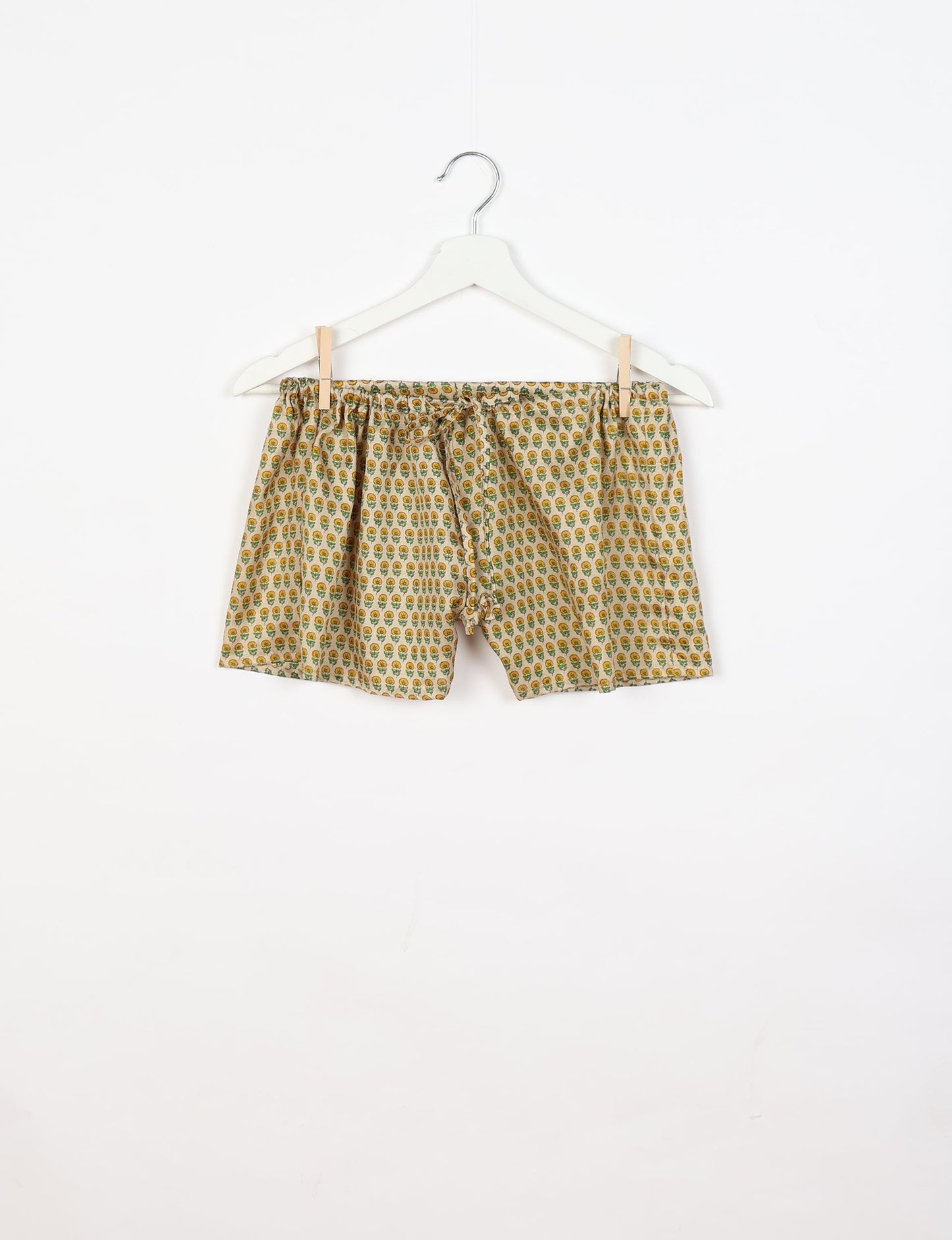 Sleep in eco-friendly luxury with our PJ Set Short. Made for the conscious consumer, these pajamas contribute to zero waste and sustainable practices. The cami top, adorned with delicate eyelash lace and cut on the bias, pairs seamlessly with the comfy shorts featuring an elasticated waist and drawstring tie.