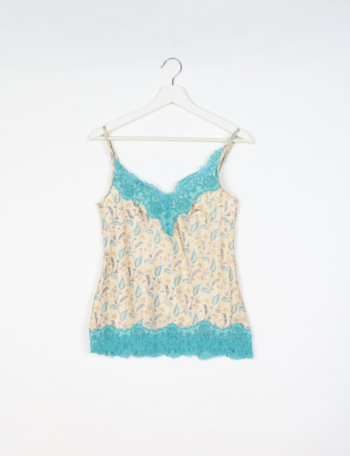 Sleep in eco-friendly luxury with our PJ Set Short. Made for the conscious consumer, these pajamas contribute to zero waste and sustainable practices. The cami top, adorned with delicate eyelash lace and cut on the bias, pairs seamlessly with the comfy shorts featuring an elasticated waist and drawstring tie.