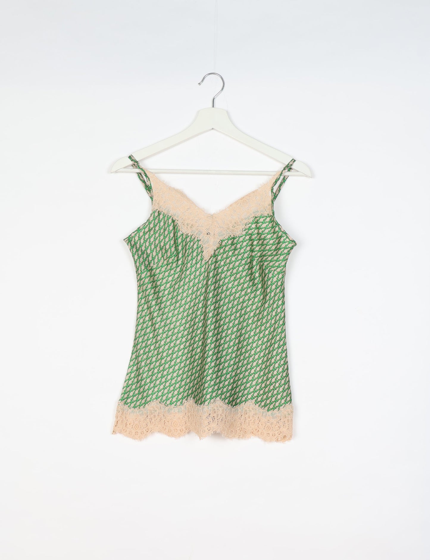 Sleep in eco-friendly luxury with our PJ Set Short. Made for the conscious consumer, these pajamas contribute to zero waste and sustainable practices. The cami top, adorned with delicate eyelash lace and cut on the bias, pairs seamlessly with the comfy shorts featuring an elasticated waist and drawstring tie.