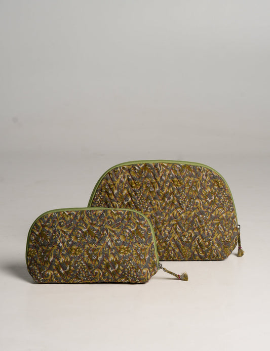 A set of two Vanity Pouches, featuring embellished beaded pullers, made from sustainable materials for eco-conscious travelers.