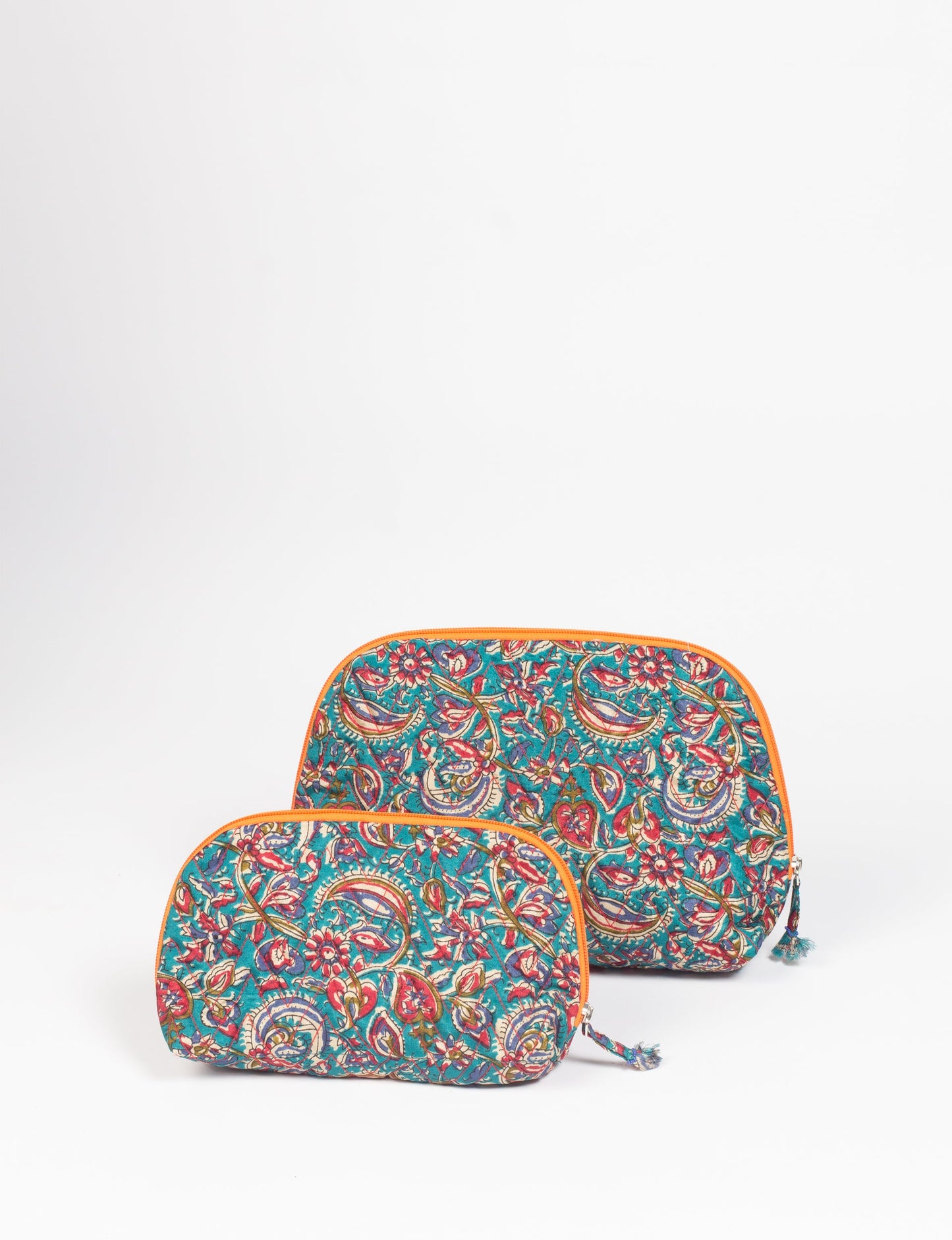 A set of two Vanity Pouches, featuring embellished beaded pullers, made from sustainable materials for eco-conscious travelers.