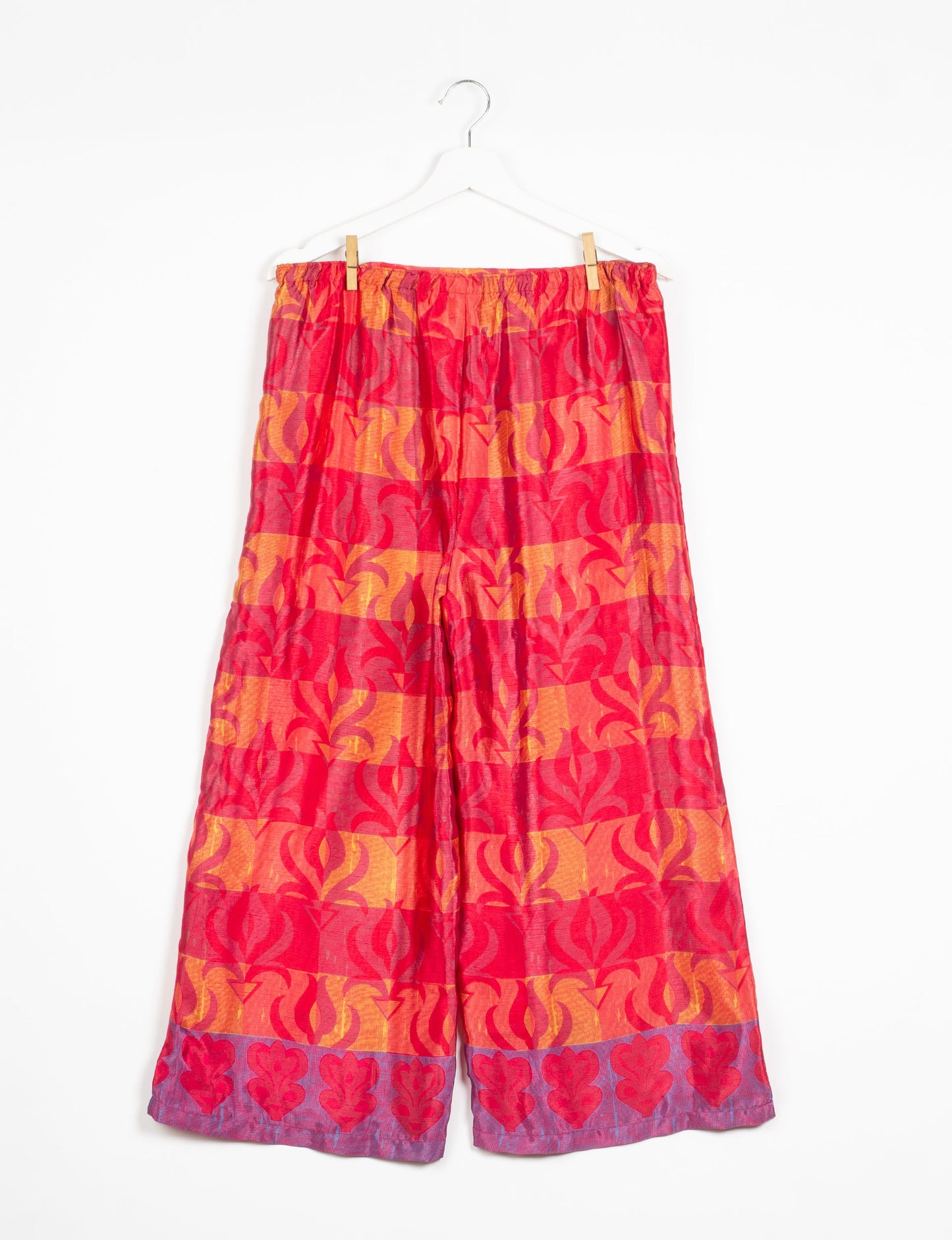 Step into sustainable fashion with our Palazzo Pants – a harmonious blend of Indian and Italian influences. These wide-legged pants, made from upcycled saris, offer comfort with an all-around elastic waist and a stylish flared leg. Make a statement with eco-friendly, chic palazzo pants that redefine ethical clothing.