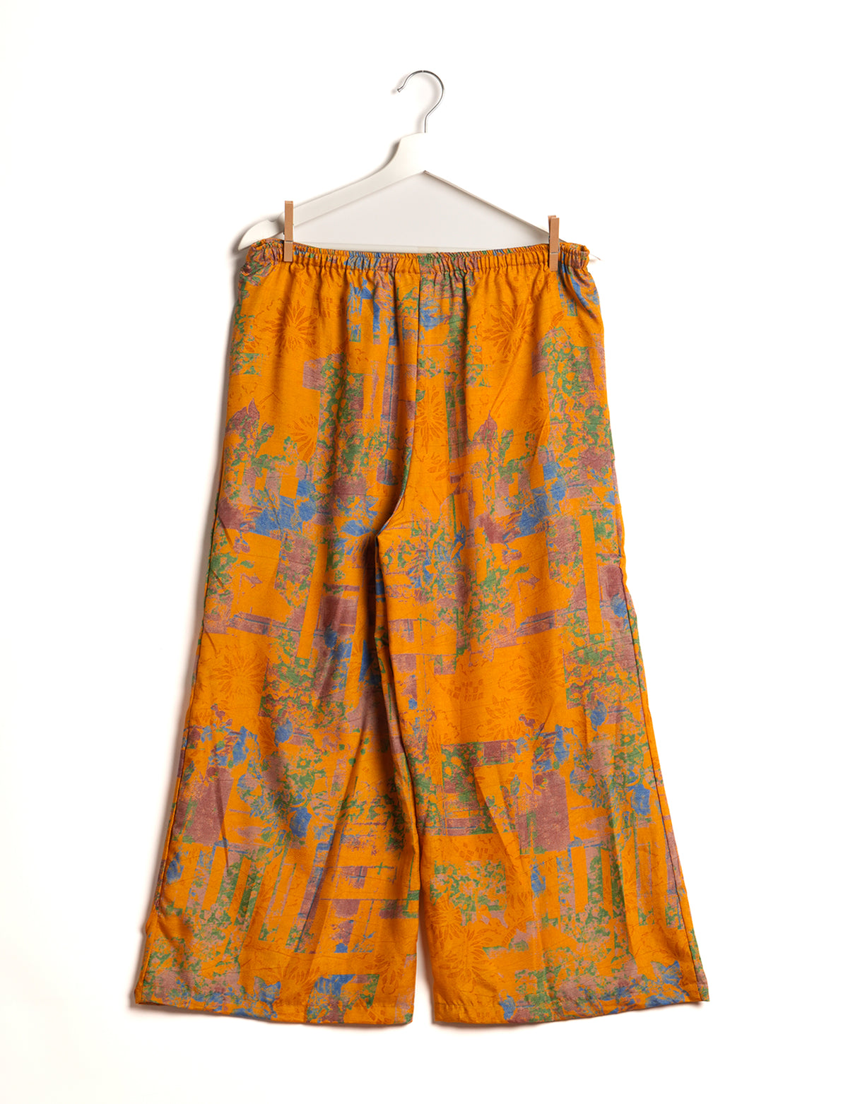 Step into sustainable fashion with our Palazzo Pants – a harmonious blend of Indian and Italian influences. These wide-legged pants, made from upcycled saris, offer comfort with an all-around elastic waist and a stylish flared leg. Make a statement with eco-friendly, chic palazzo pants that redefine ethical clothing.