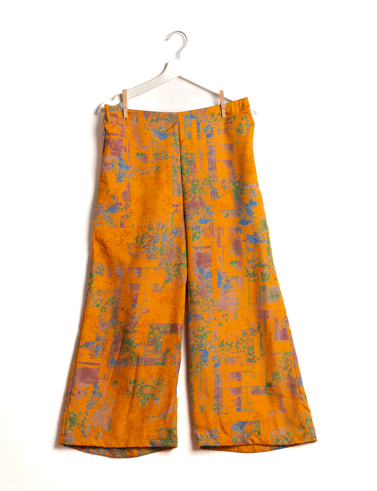 Step into sustainable fashion with our Palazzo Pants – a harmonious blend of Indian and Italian influences. These wide-legged pants, made from upcycled saris, offer comfort with an all-around elastic waist and a stylish flared leg. Make a statement with eco-friendly, chic palazzo pants that redefine ethical clothing.