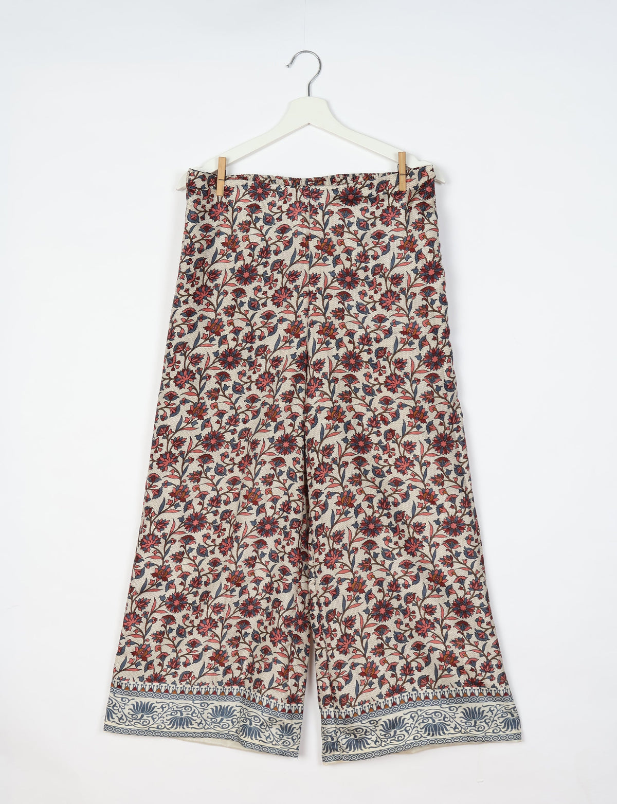 Step into sustainable fashion with our Palazzo Pants – a harmonious blend of Indian and Italian influences. These wide-legged pants, made from upcycled saris, offer comfort with an all-around elastic waist and a stylish flared leg. Make a statement with eco-friendly, chic palazzo pants that redefine ethical clothing.