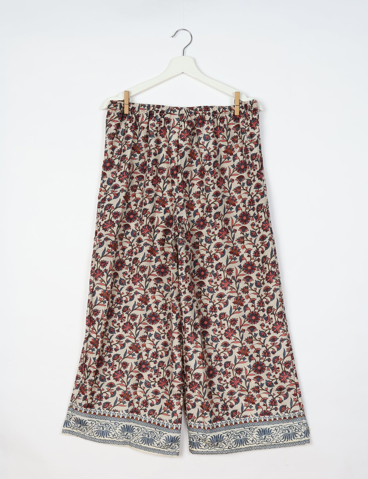 Step into sustainable fashion with our Palazzo Pants – a harmonious blend of Indian and Italian influences. These wide-legged pants, made from upcycled saris, offer comfort with an all-around elastic waist and a stylish flared leg. Make a statement with eco-friendly, chic palazzo pants that redefine ethical clothing.