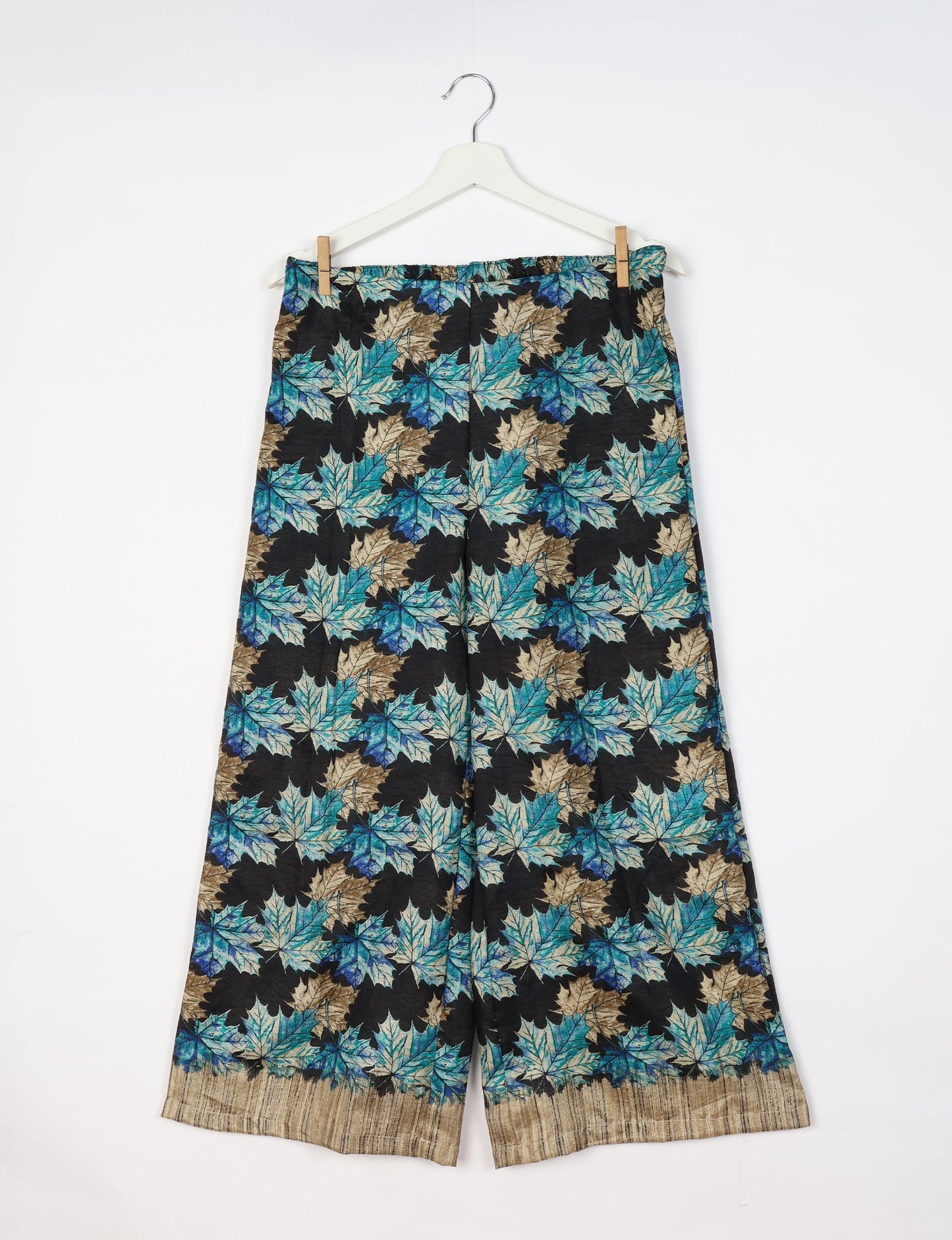 Step into sustainable fashion with our Palazzo Pants – a harmonious blend of Indian and Italian influences. These wide-legged pants, made from upcycled saris, offer comfort with an all-around elastic waist and a stylish flared leg. Make a statement with eco-friendly, chic palazzo pants that redefine ethical clothing.