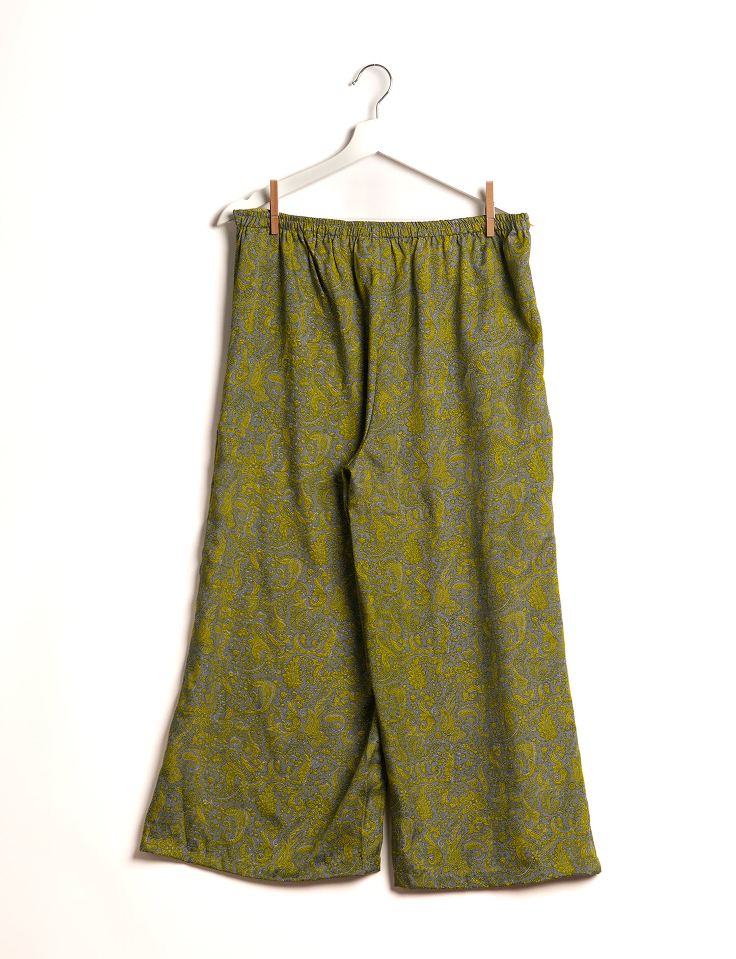 Step into sustainable fashion with our Palazzo Pants – a harmonious blend of Indian and Italian influences. These wide-legged pants, made from upcycled saris, offer comfort with an all-around elastic waist and a stylish flared leg. Make a statement with eco-friendly, chic palazzo pants that redefine ethical clothing.