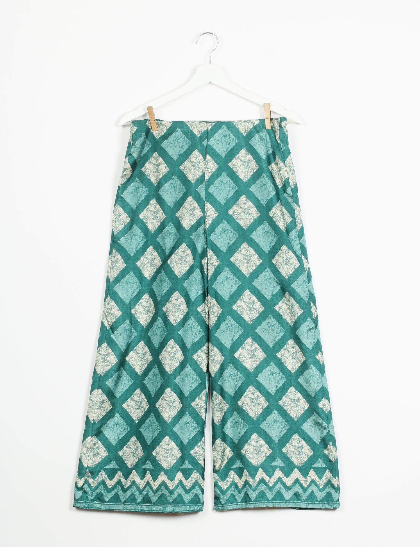 Step into sustainable fashion with our Palazzo Pants – a harmonious blend of Indian and Italian influences. These wide-legged pants, made from upcycled saris, offer comfort with an all-around elastic waist and a stylish flared leg. Make a statement with eco-friendly, chic palazzo pants that redefine ethical clothing.