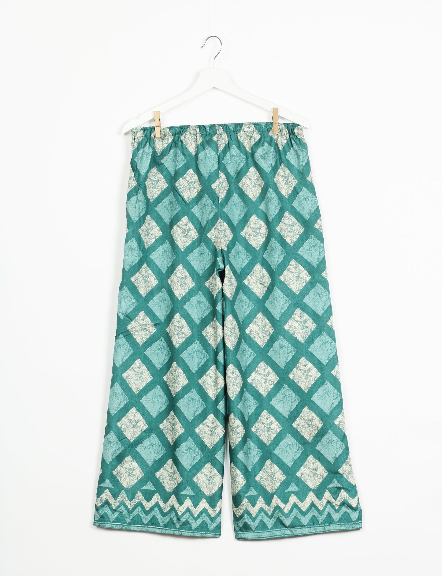 Step into sustainable fashion with our Palazzo Pants – a harmonious blend of Indian and Italian influences. These wide-legged pants, made from upcycled saris, offer comfort with an all-around elastic waist and a stylish flared leg. Make a statement with eco-friendly, chic palazzo pants that redefine ethical clothing.