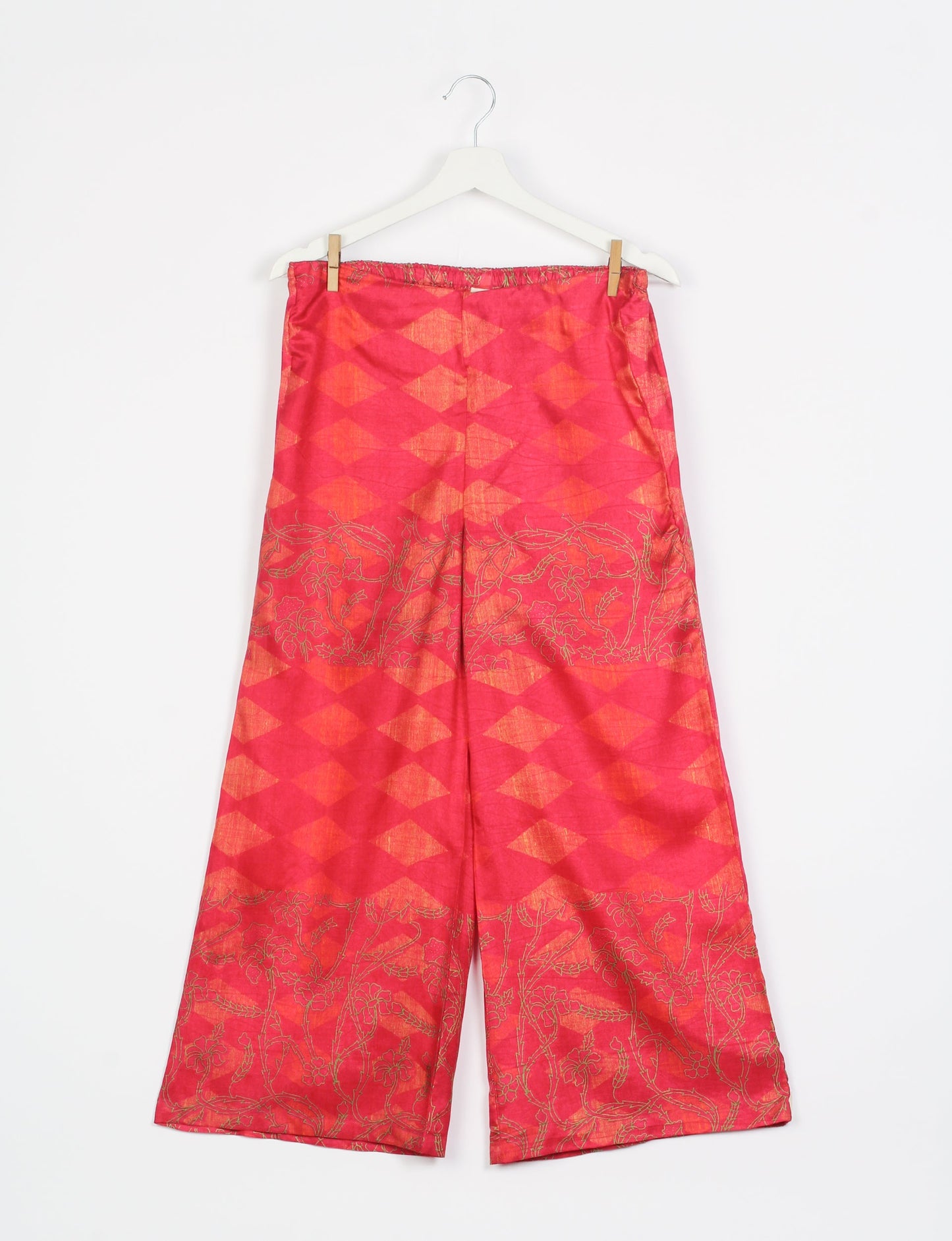 Step into sustainable fashion with our Palazzo Pants – a harmonious blend of Indian and Italian influences. These wide-legged pants, made from upcycled saris, offer comfort with an all-around elastic waist and a stylish flared leg. Make a statement with eco-friendly, chic palazzo pants that redefine ethical clothing.