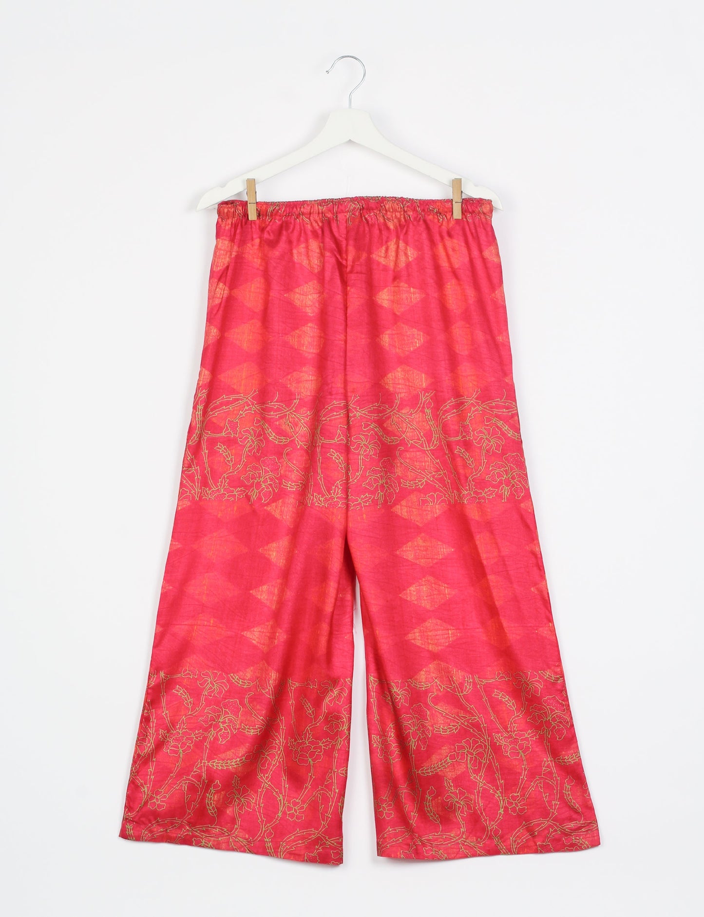 Step into sustainable fashion with our Palazzo Pants – a harmonious blend of Indian and Italian influences. These wide-legged pants, made from upcycled saris, offer comfort with an all-around elastic waist and a stylish flared leg. Make a statement with eco-friendly, chic palazzo pants that redefine ethical clothing.