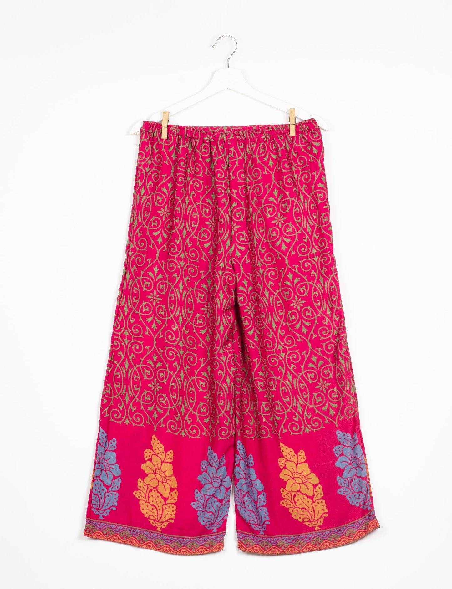 Step into sustainable fashion with our Palazzo Pants – a harmonious blend of Indian and Italian influences. These wide-legged pants, made from upcycled saris, offer comfort with an all-around elastic waist and a stylish flared leg. Make a statement with eco-friendly, chic palazzo pants that redefine ethical clothing.