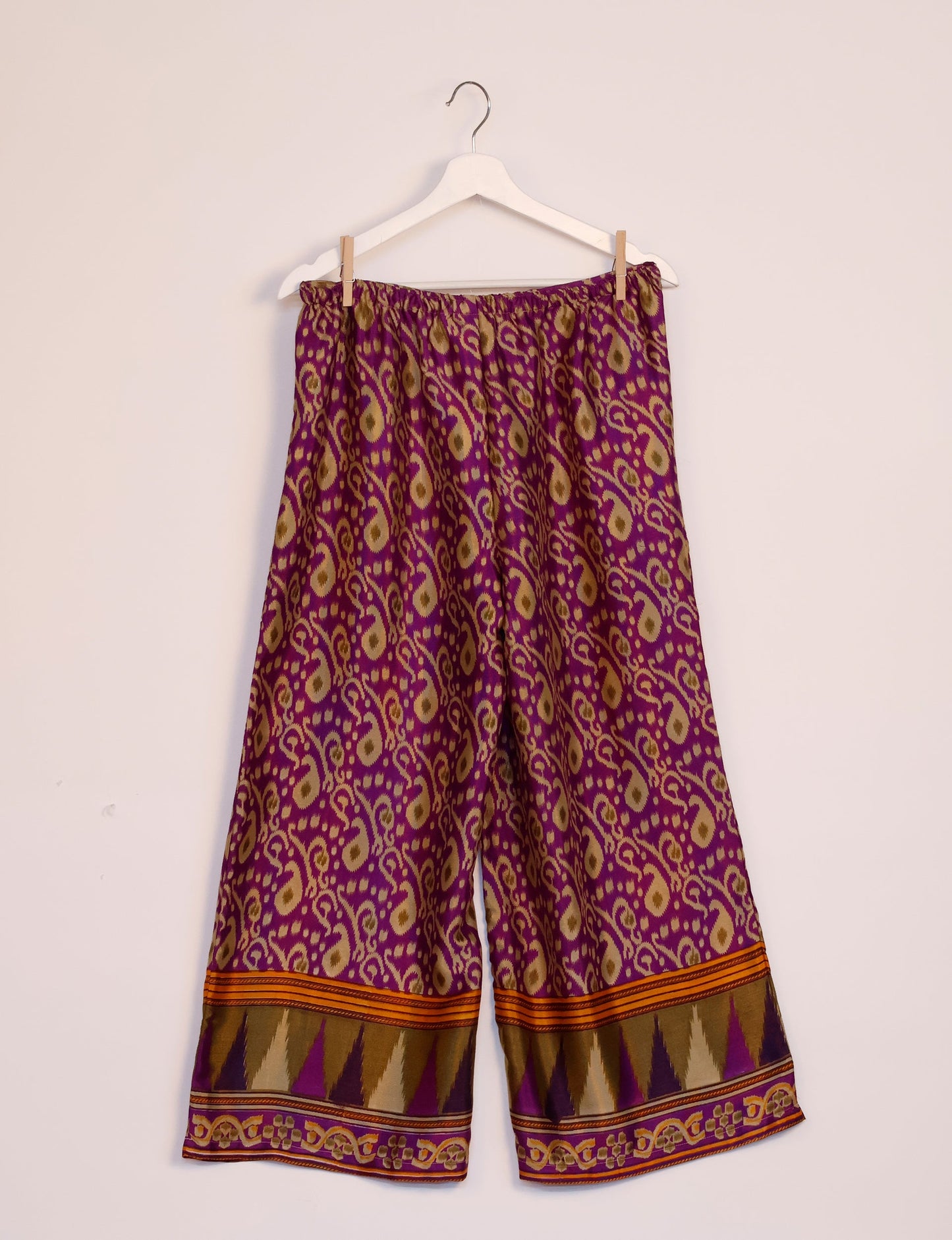 Step into sustainable fashion with our Palazzo Pants – a harmonious blend of Indian and Italian influences. These wide-legged pants, made from upcycled saris, offer comfort with an all-around elastic waist and a stylish flared leg. Make a statement with eco-friendly, chic palazzo pants that redefine ethical clothing.