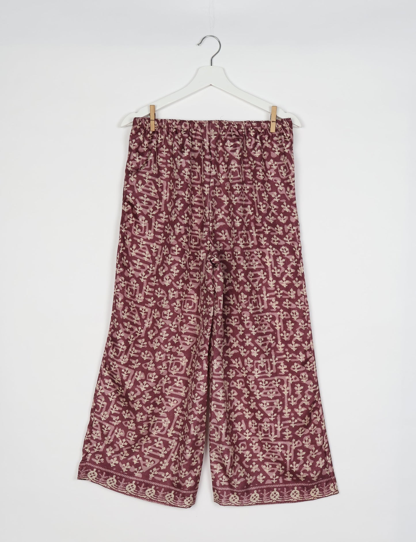 Step into sustainable fashion with our Palazzo Pants – a harmonious blend of Indian and Italian influences. These wide-legged pants, made from upcycled saris, offer comfort with an all-around elastic waist and a stylish flared leg. Make a statement with eco-friendly, chic palazzo pants that redefine ethical clothing.