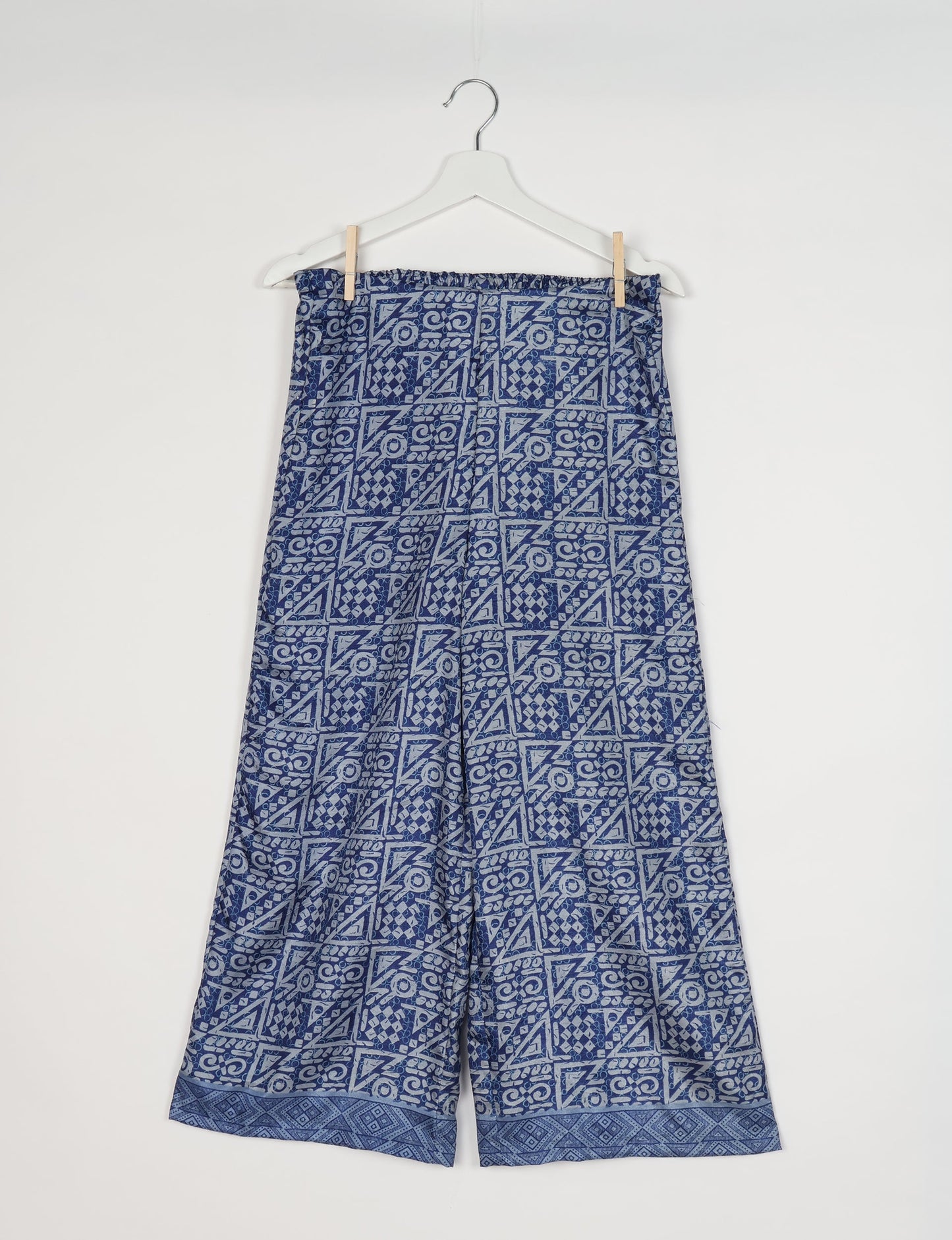 Step into sustainable fashion with our Palazzo Pants – a harmonious blend of Indian and Italian influences. These wide-legged pants, made from upcycled saris, offer comfort with an all-around elastic waist and a stylish flared leg. Make a statement with eco-friendly, chic palazzo pants that redefine ethical clothing.