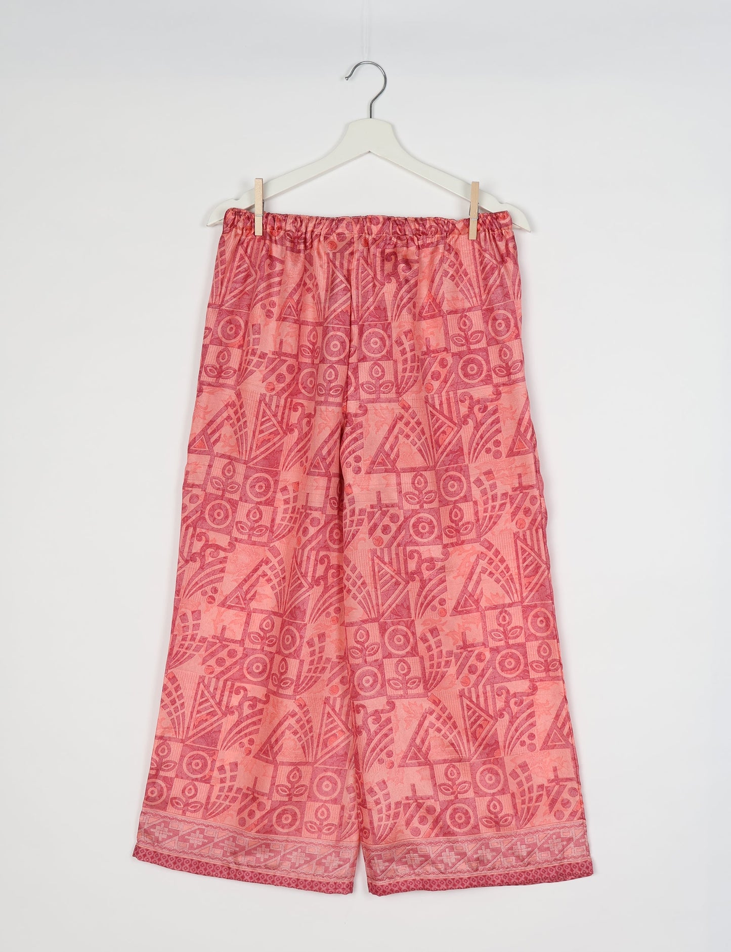 Step into sustainable fashion with our Palazzo Pants – a harmonious blend of Indian and Italian influences. These wide-legged pants, made from upcycled saris, offer comfort with an all-around elastic waist and a stylish flared leg. Make a statement with eco-friendly, chic palazzo pants that redefine ethical clothing.