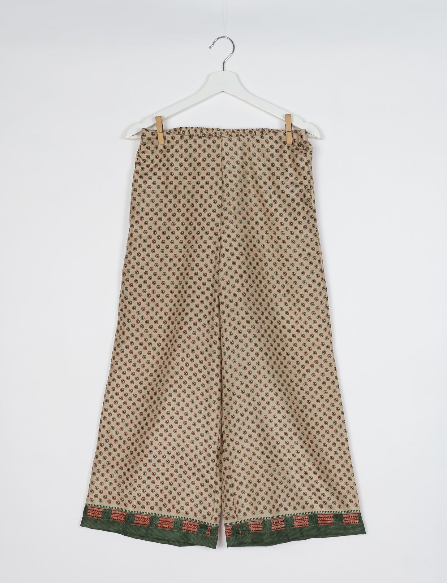 Step into sustainable fashion with our Palazzo Pants – a harmonious blend of Indian and Italian influences. These wide-legged pants, made from upcycled saris, offer comfort with an all-around elastic waist and a stylish flared leg. Make a statement with eco-friendly, chic palazzo pants that redefine ethical clothing.