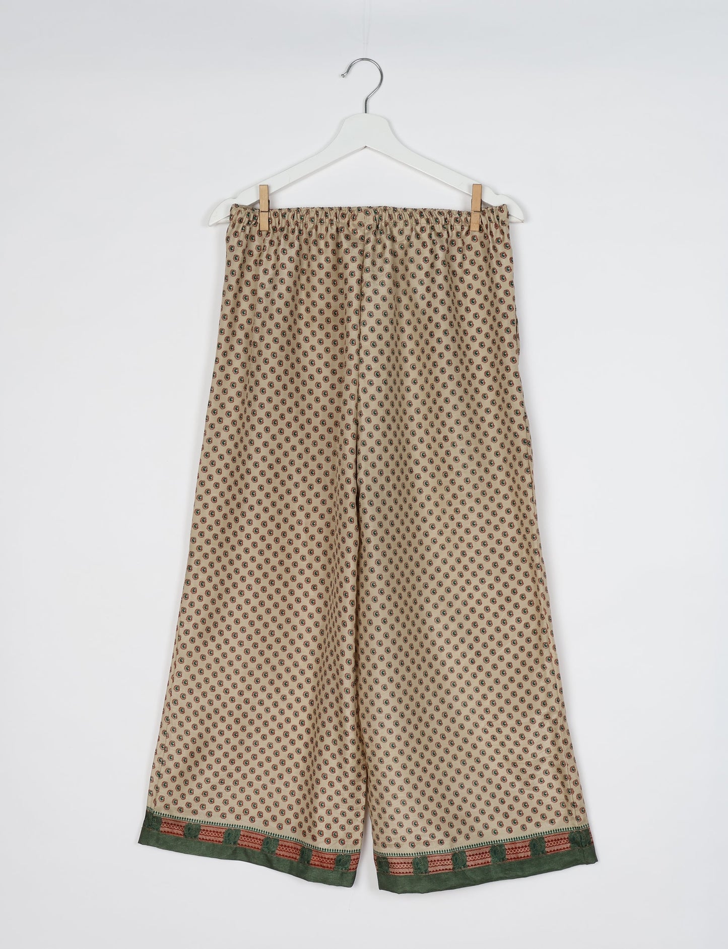 Step into sustainable fashion with our Palazzo Pants – a harmonious blend of Indian and Italian influences. These wide-legged pants, made from upcycled saris, offer comfort with an all-around elastic waist and a stylish flared leg. Make a statement with eco-friendly, chic palazzo pants that redefine ethical clothing.