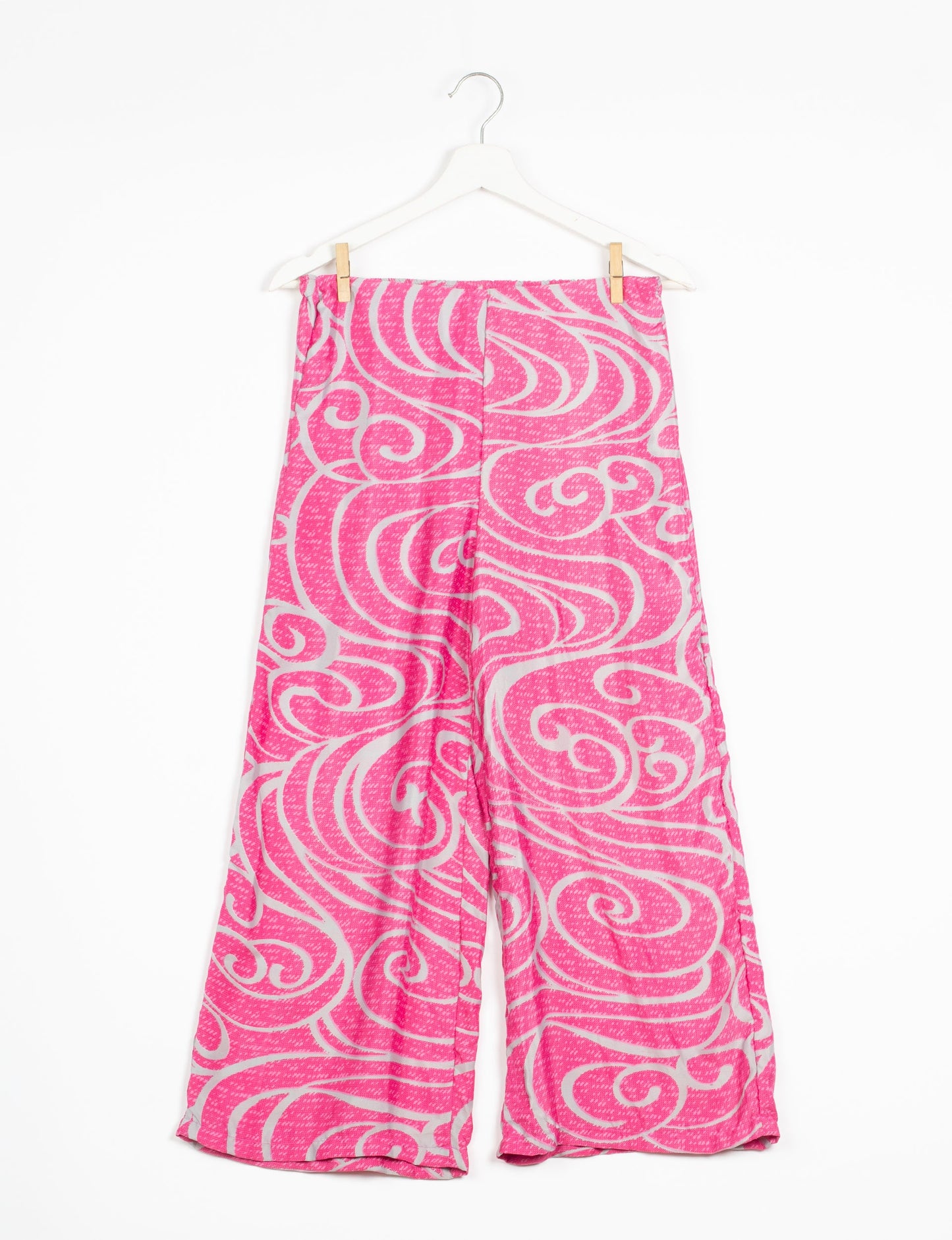 Step into sustainable fashion with our Palazzo Pants – a harmonious blend of Indian and Italian influences. These wide-legged pants, made from upcycled saris, offer comfort with an all-around elastic waist and a stylish flared leg. Make a statement with eco-friendly, chic palazzo pants that redefine ethical clothing.