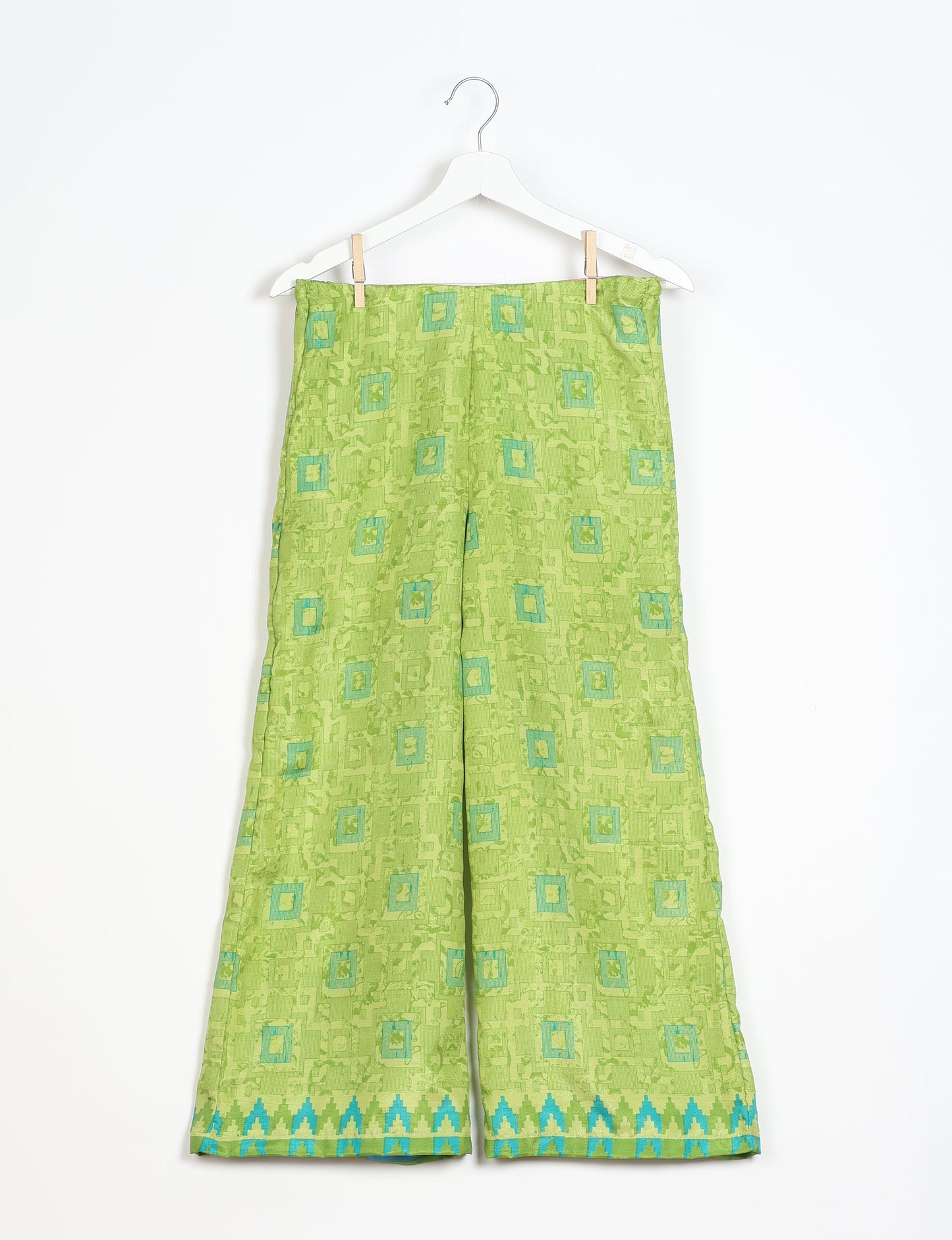 Step into sustainable fashion with our Palazzo Pants – a harmonious blend of Indian and Italian influences. These wide-legged pants, made from upcycled saris, offer comfort with an all-around elastic waist and a stylish flared leg. Make a statement with eco-friendly, chic palazzo pants that redefine ethical clothing.