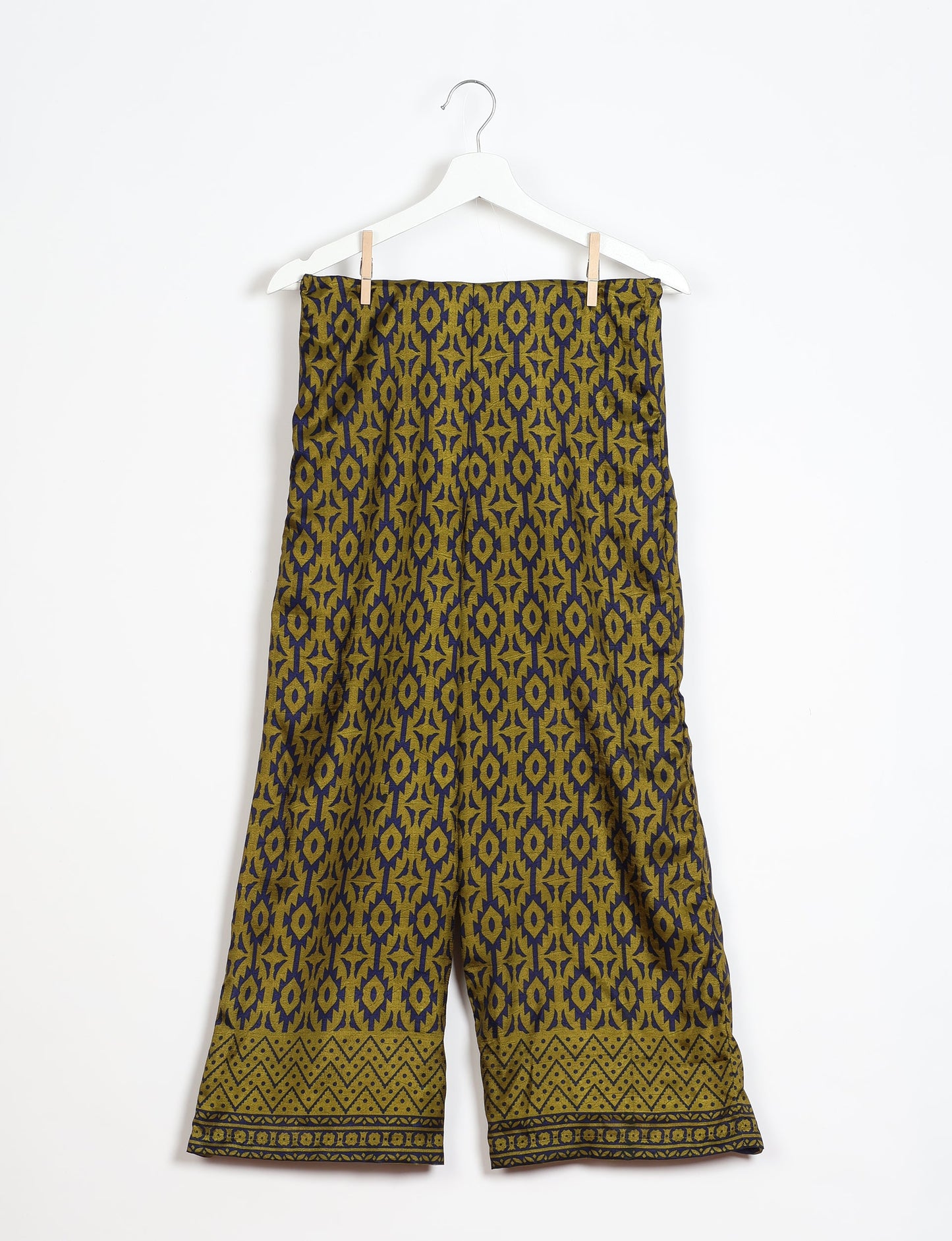 Step into sustainable fashion with our Palazzo Pants – a harmonious blend of Indian and Italian influences. These wide-legged pants, made from upcycled saris, offer comfort with an all-around elastic waist and a stylish flared leg. Make a statement with eco-friendly, chic palazzo pants that redefine ethical clothing.