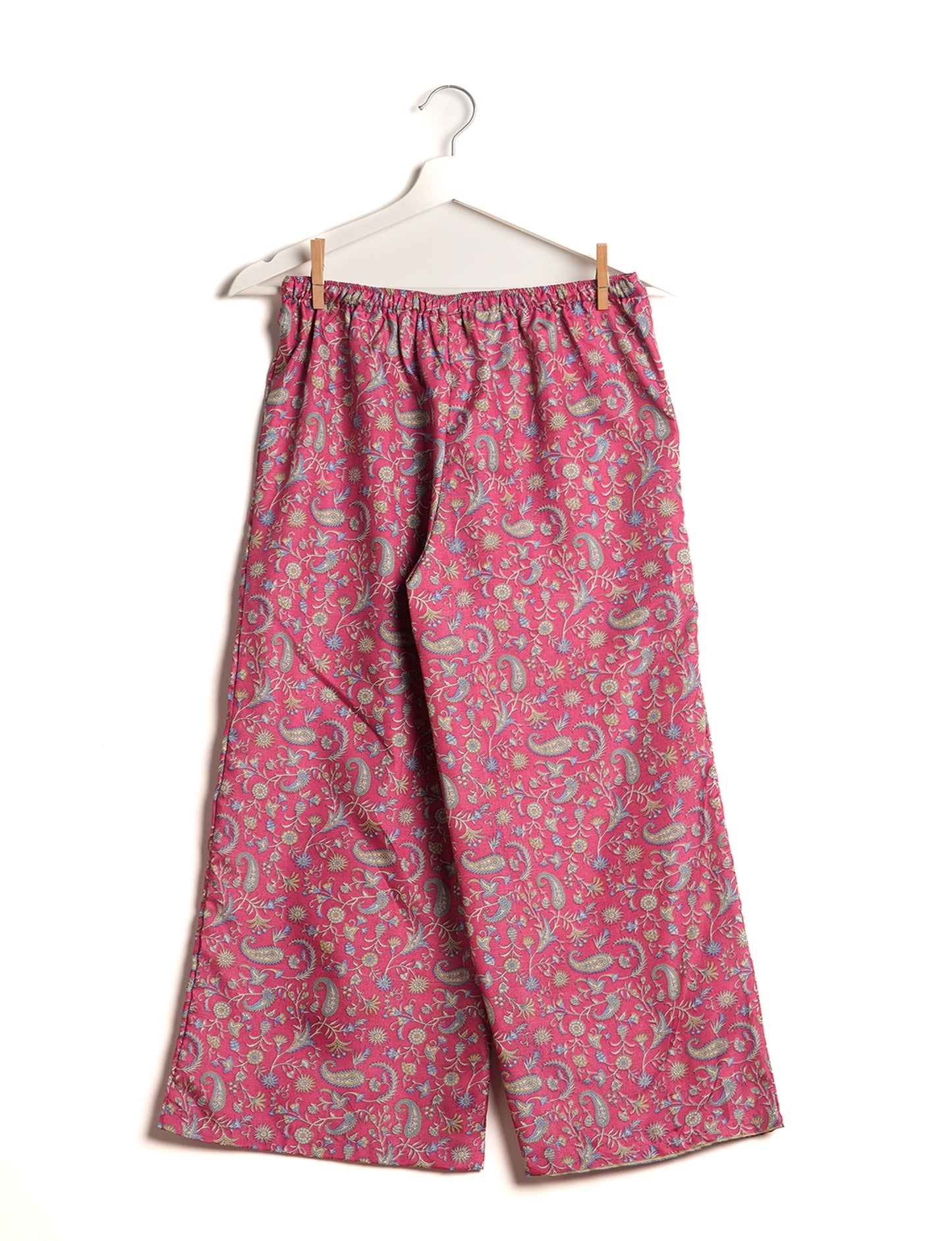 Step into sustainable fashion with our Palazzo Pants – a harmonious blend of Indian and Italian influences. These wide-legged pants, made from upcycled saris, offer comfort with an all-around elastic waist and a stylish flared leg. Make a statement with eco-friendly, chic palazzo pants that redefine ethical clothing.