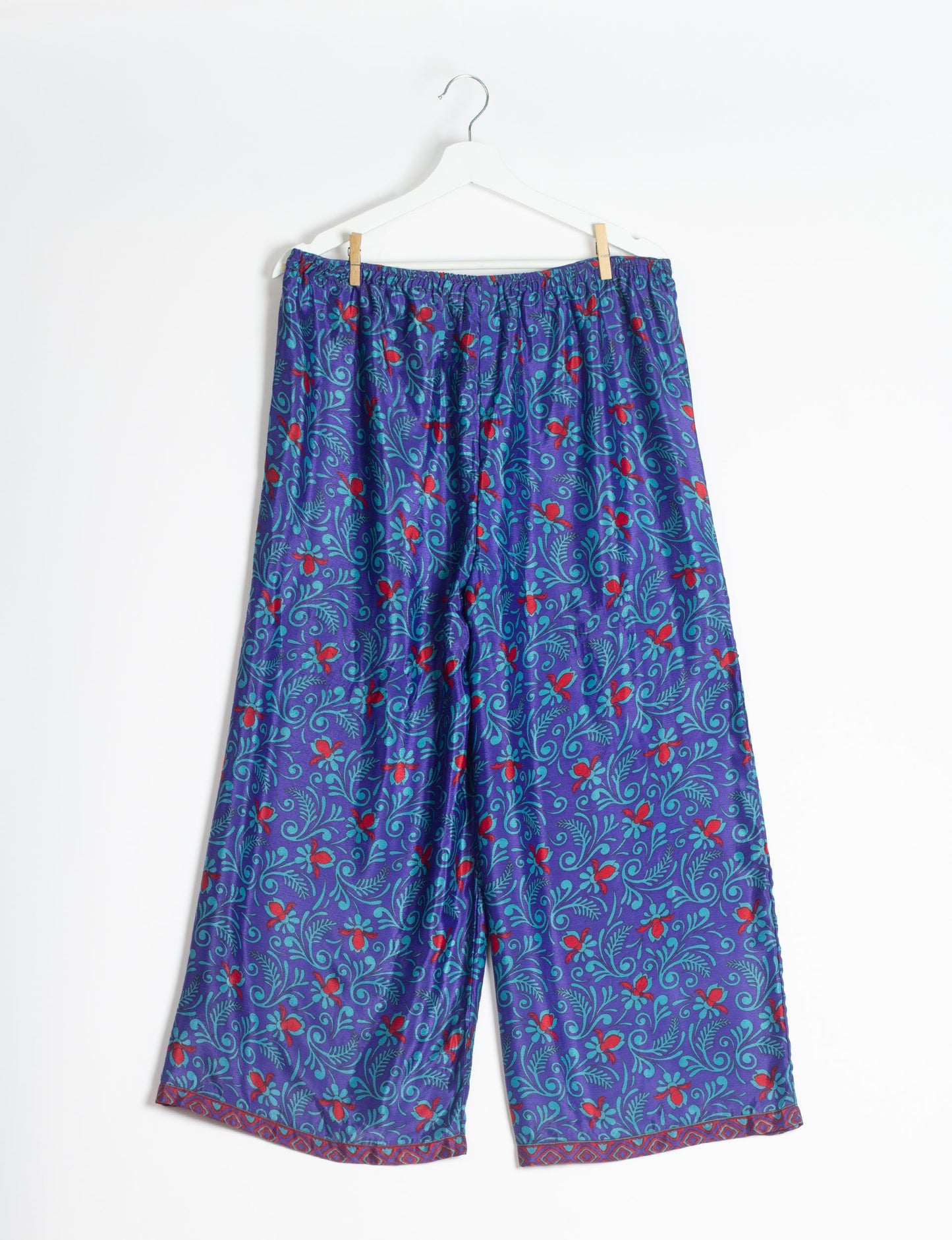 Step into sustainable fashion with our Palazzo Pants – a harmonious blend of Indian and Italian influences. These wide-legged pants, made from upcycled saris, offer comfort with an all-around elastic waist and a stylish flared leg. Make a statement with eco-friendly, chic palazzo pants that redefine ethical clothing.