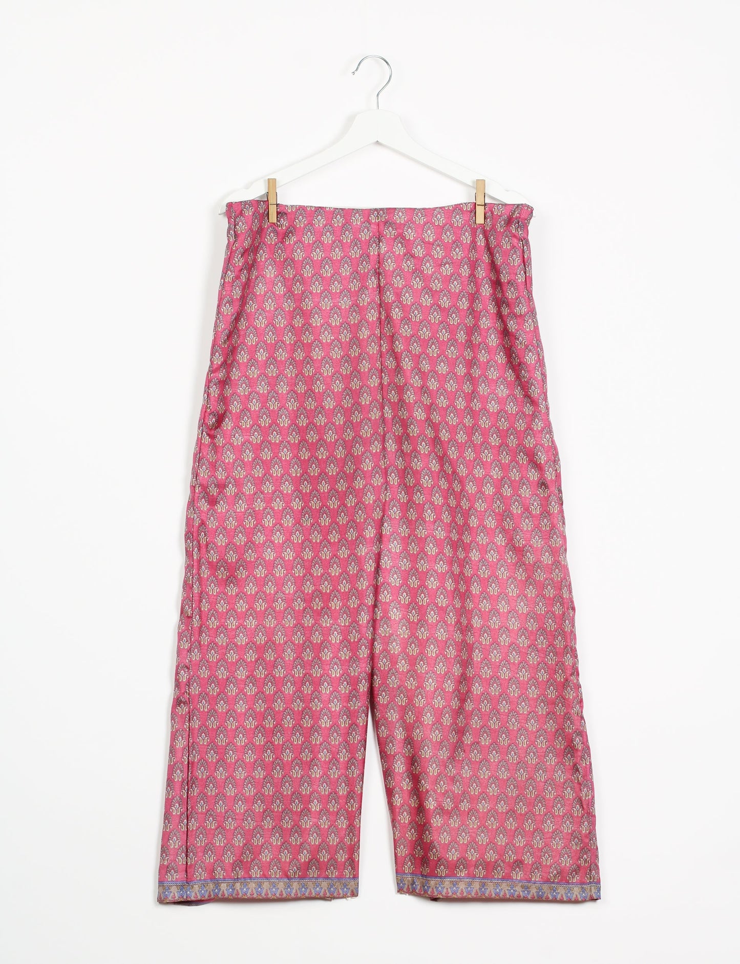 Step into sustainable fashion with our Palazzo Pants – a harmonious blend of Indian and Italian influences. These wide-legged pants, made from upcycled saris, offer comfort with an all-around elastic waist and a stylish flared leg. Make a statement with eco-friendly, chic palazzo pants that redefine ethical clothing.