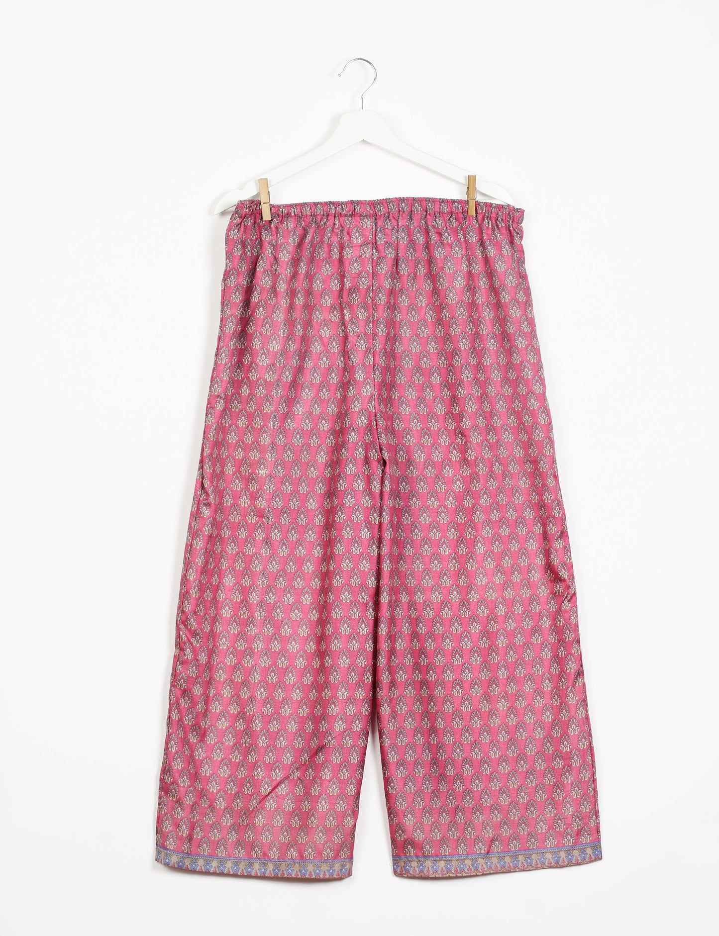 Step into sustainable fashion with our Palazzo Pants – a harmonious blend of Indian and Italian influences. These wide-legged pants, made from upcycled saris, offer comfort with an all-around elastic waist and a stylish flared leg. Make a statement with eco-friendly, chic palazzo pants that redefine ethical clothing.