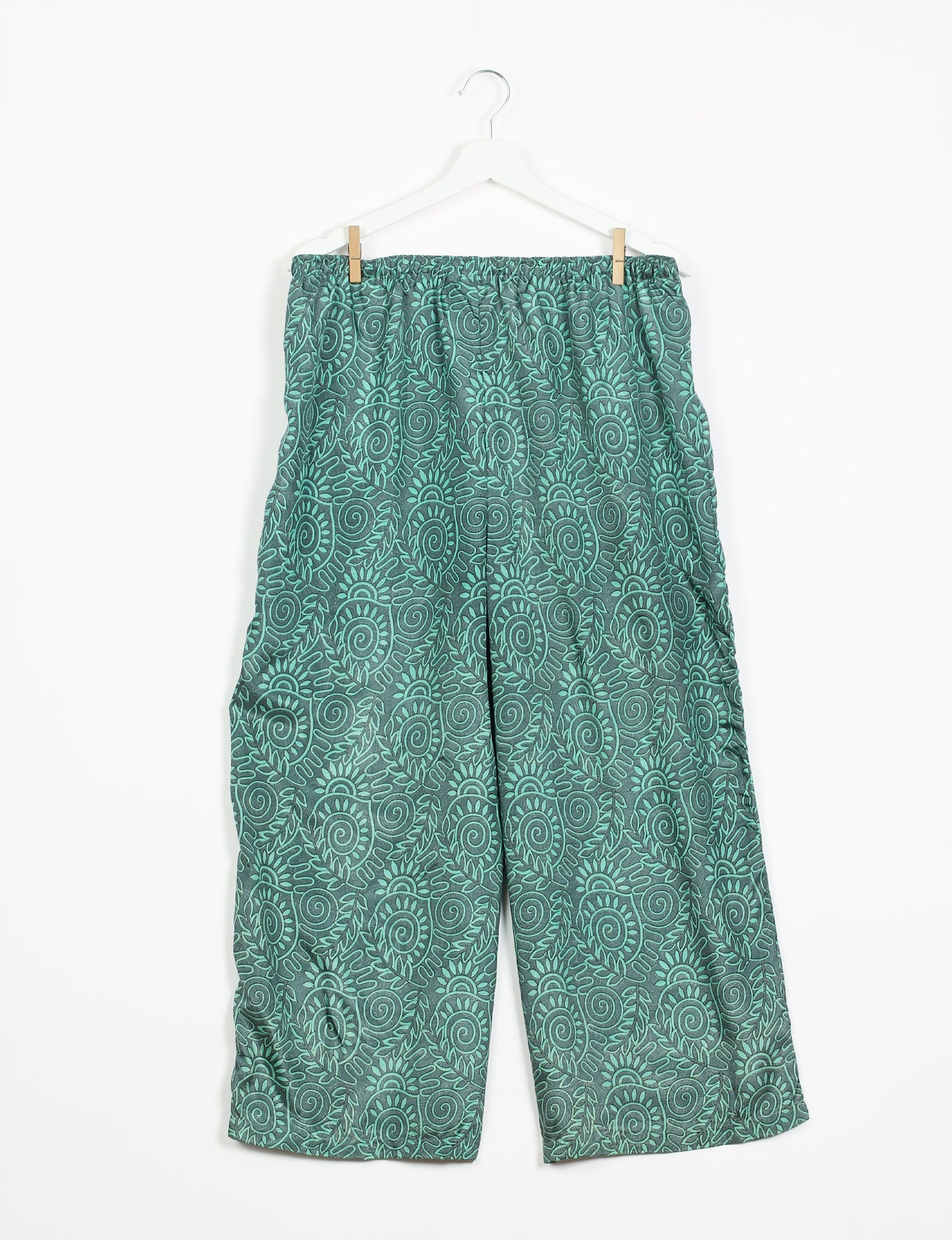 Step into sustainable fashion with our Palazzo Pants – a harmonious blend of Indian and Italian influences. These wide-legged pants, made from upcycled saris, offer comfort with an all-around elastic waist and a stylish flared leg. Make a statement with eco-friendly, chic palazzo pants that redefine ethical clothing.