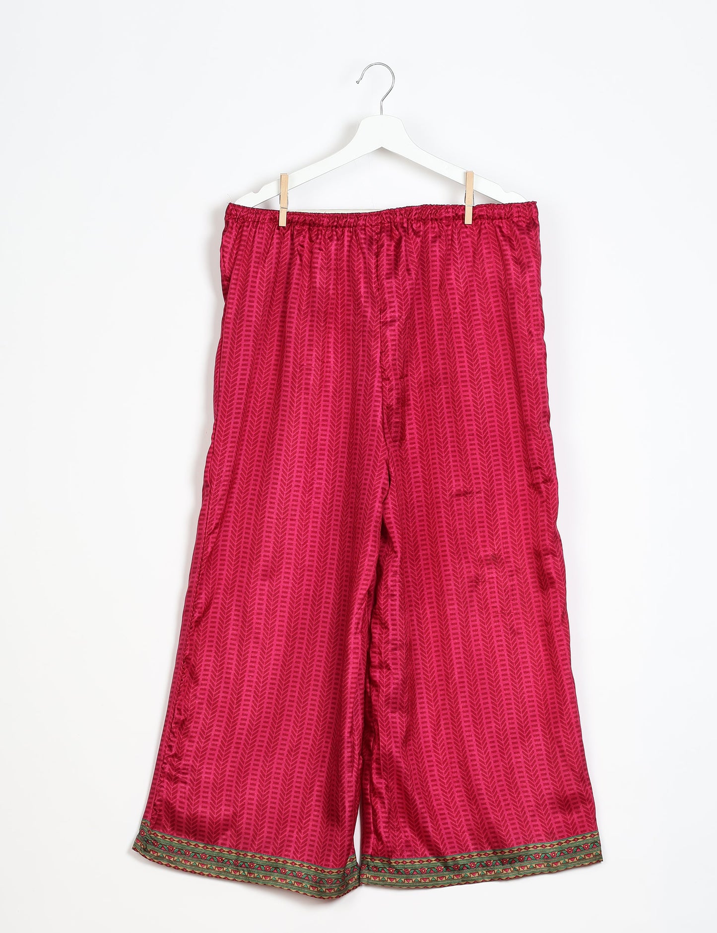 Step into sustainable fashion with our Palazzo Pants – a harmonious blend of Indian and Italian influences. These wide-legged pants, made from upcycled saris, offer comfort with an all-around elastic waist and a stylish flared leg. Make a statement with eco-friendly, chic palazzo pants that redefine ethical clothing.