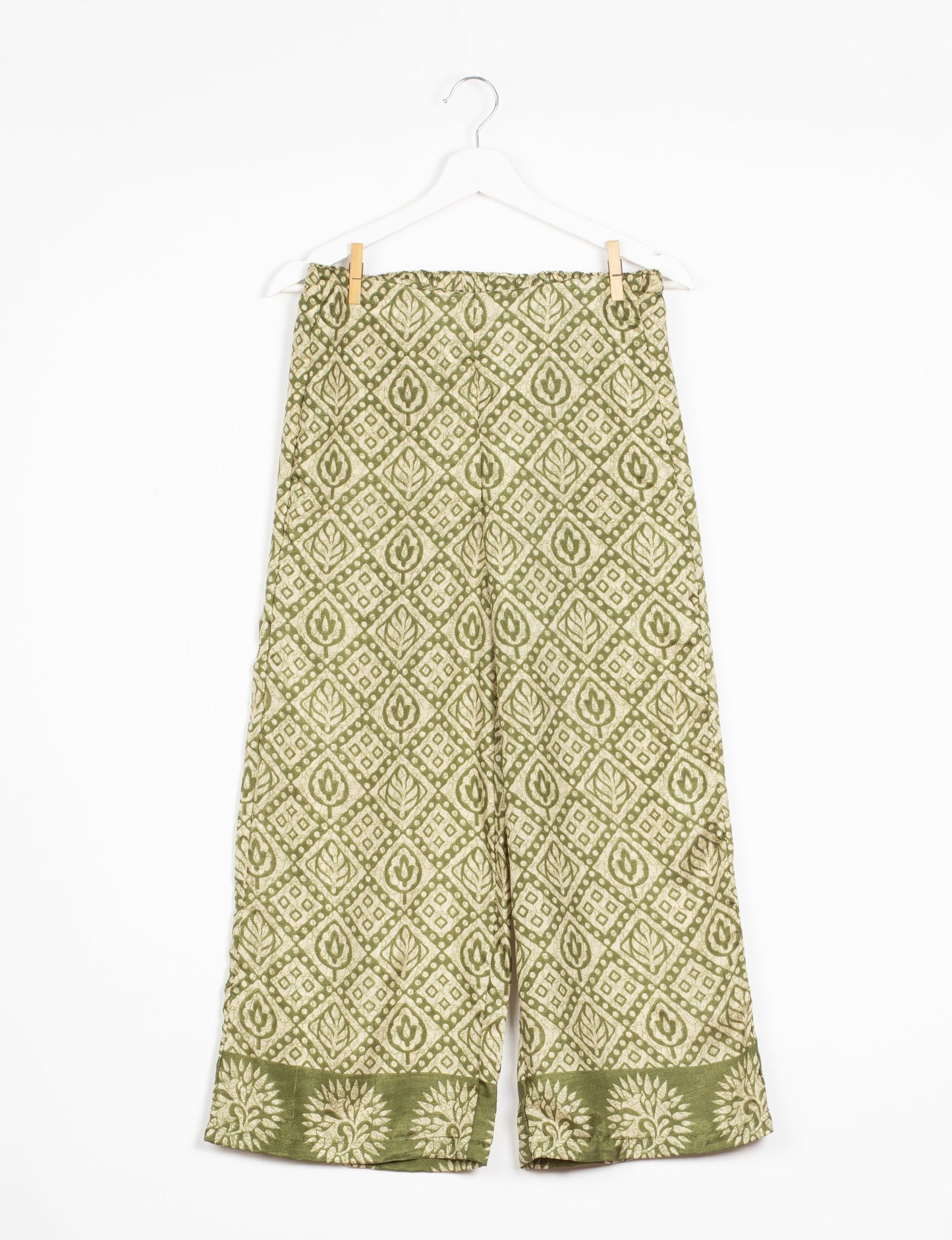 Step into sustainable fashion with our Palazzo Pants – a harmonious blend of Indian and Italian influences. These wide-legged pants, made from upcycled saris, offer comfort with an all-around elastic waist and a stylish flared leg. Make a statement with eco-friendly, chic palazzo pants that redefine ethical clothing.