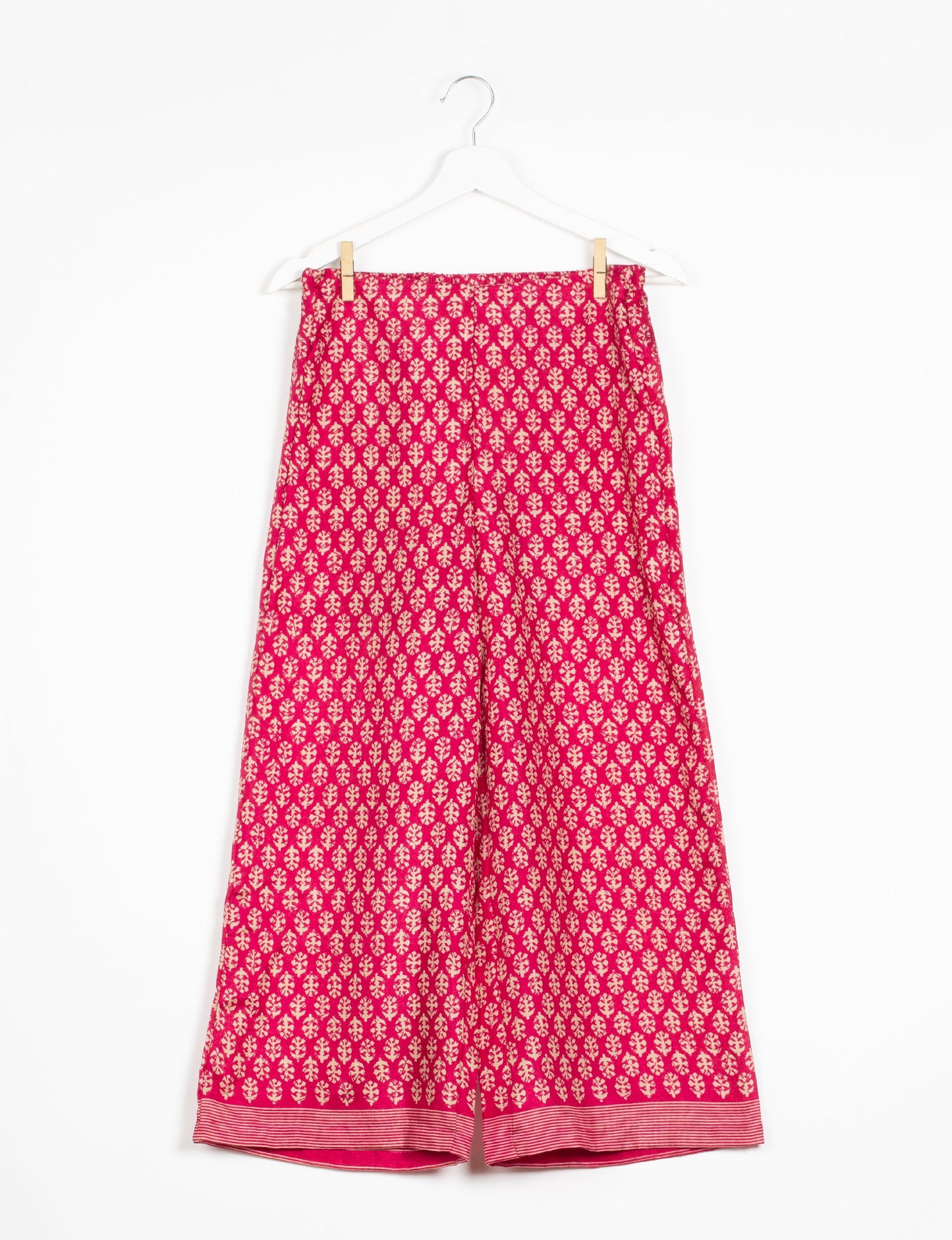 Step into sustainable fashion with our Palazzo Pants – a harmonious blend of Indian and Italian influences. These wide-legged pants, made from upcycled saris, offer comfort with an all-around elastic waist and a stylish flared leg. Make a statement with eco-friendly, chic palazzo pants that redefine ethical clothing.