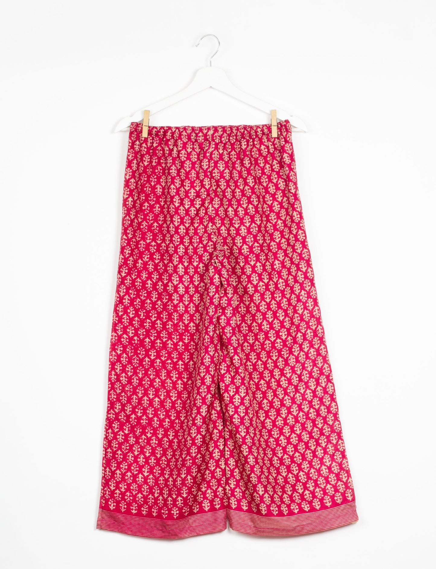 Step into sustainable fashion with our Palazzo Pants – a harmonious blend of Indian and Italian influences. These wide-legged pants, made from upcycled saris, offer comfort with an all-around elastic waist and a stylish flared leg. Make a statement with eco-friendly, chic palazzo pants that redefine ethical clothing.