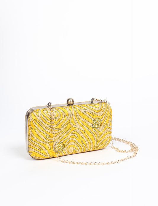 Stylish CLUTCH HANDBAG, a perfect companion for your evening look. Firm rectangular frame, optional metallic sling, and stunning prints add color to your outfit. Eco-friendly and ethically crafted for sustainable fashion.