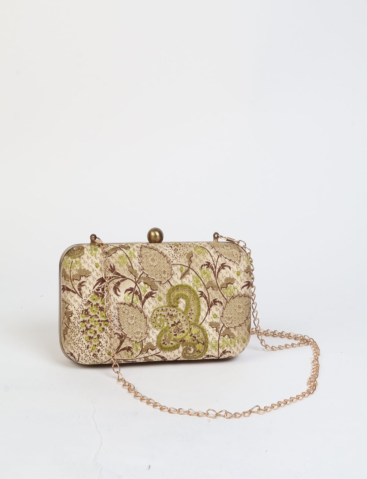 Beige paisley-patterned clutch handbag with gold-tone metal frame, ball clasp, and detachable chain strap, front view