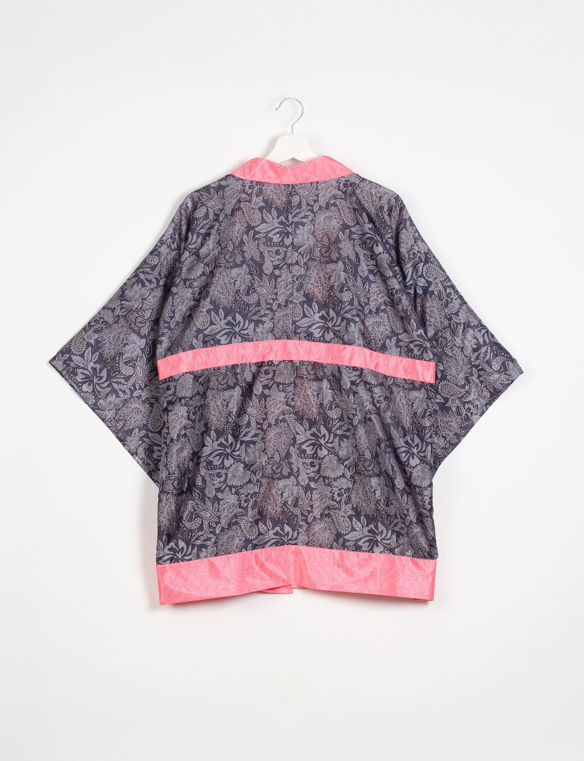 Radiant and sustainably crafted KIMONO with humble beginnings from the streets of India. Versatile and eco-friendly layering piece for casual trousers, swimwear, or our spaghetti strap dress. Embrace conscious fashion and sustainable style with this unique and culturally inspired kimono, sure to invite compliments.