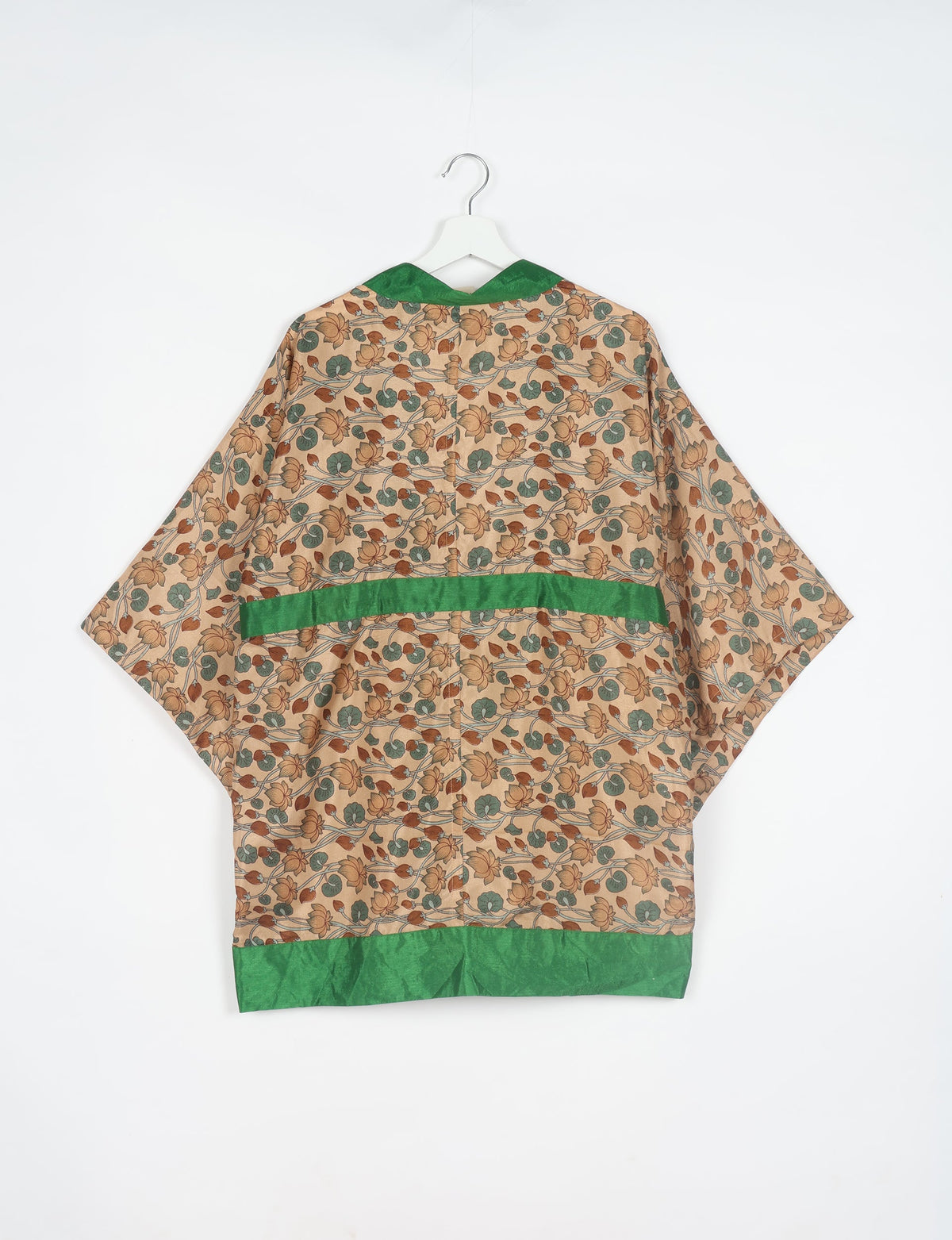 Radiant and sustainably crafted KIMONO with humble beginnings from the streets of India. Versatile and eco-friendly layering piece for casual trousers, swimwear, or our spaghetti strap dress. Embrace conscious fashion and sustainable style with this unique and culturally inspired kimono, sure to invite compliments.