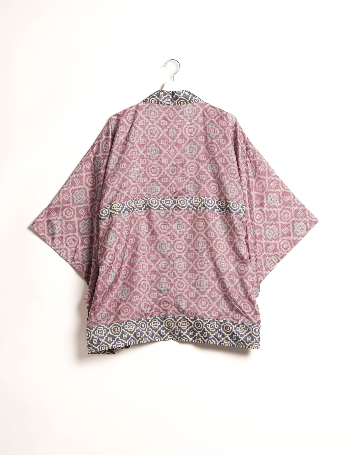 Radiant and sustainably crafted KIMONO with humble beginnings from the streets of India. Versatile and eco-friendly layering piece for casual trousers, swimwear, or our spaghetti strap dress. Embrace conscious fashion and sustainable style with this unique and culturally inspired kimono, sure to invite compliments.