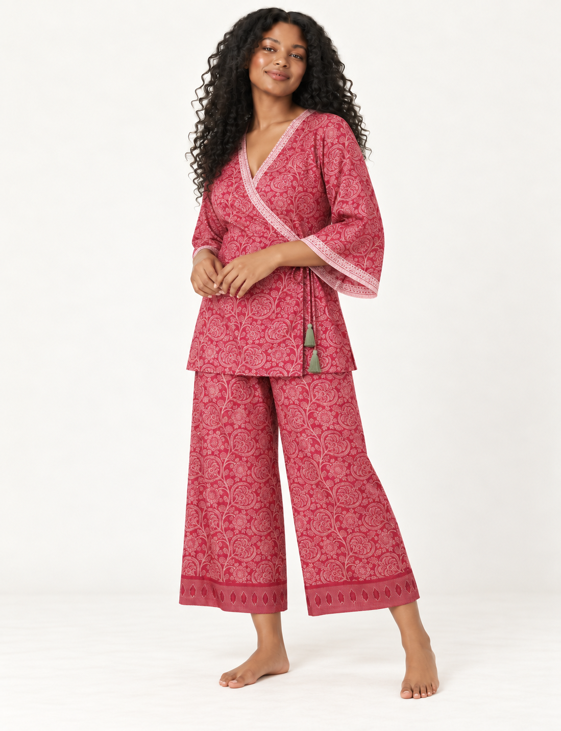 Pink tunic set with micro leaf pattern, turquoise trim on neckline and sleeves, and matching wide-leg pants with border print