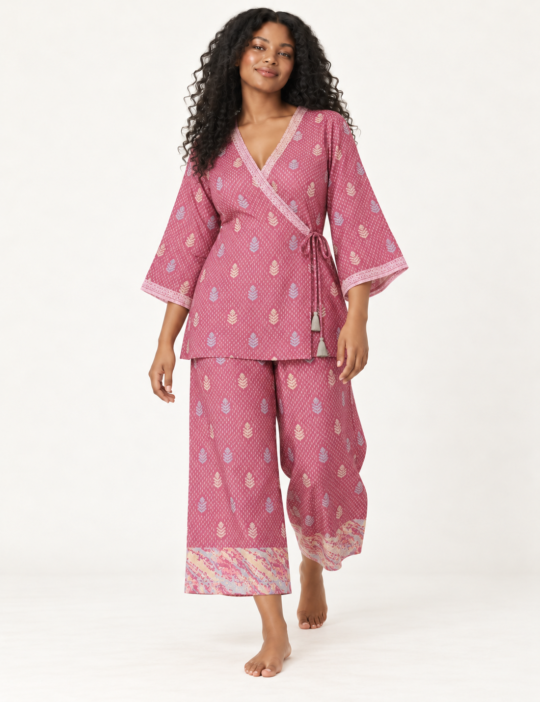 Pink tunic set with micro leaf pattern, turquoise trim on neckline and sleeves, and matching wide-leg pants with border print
