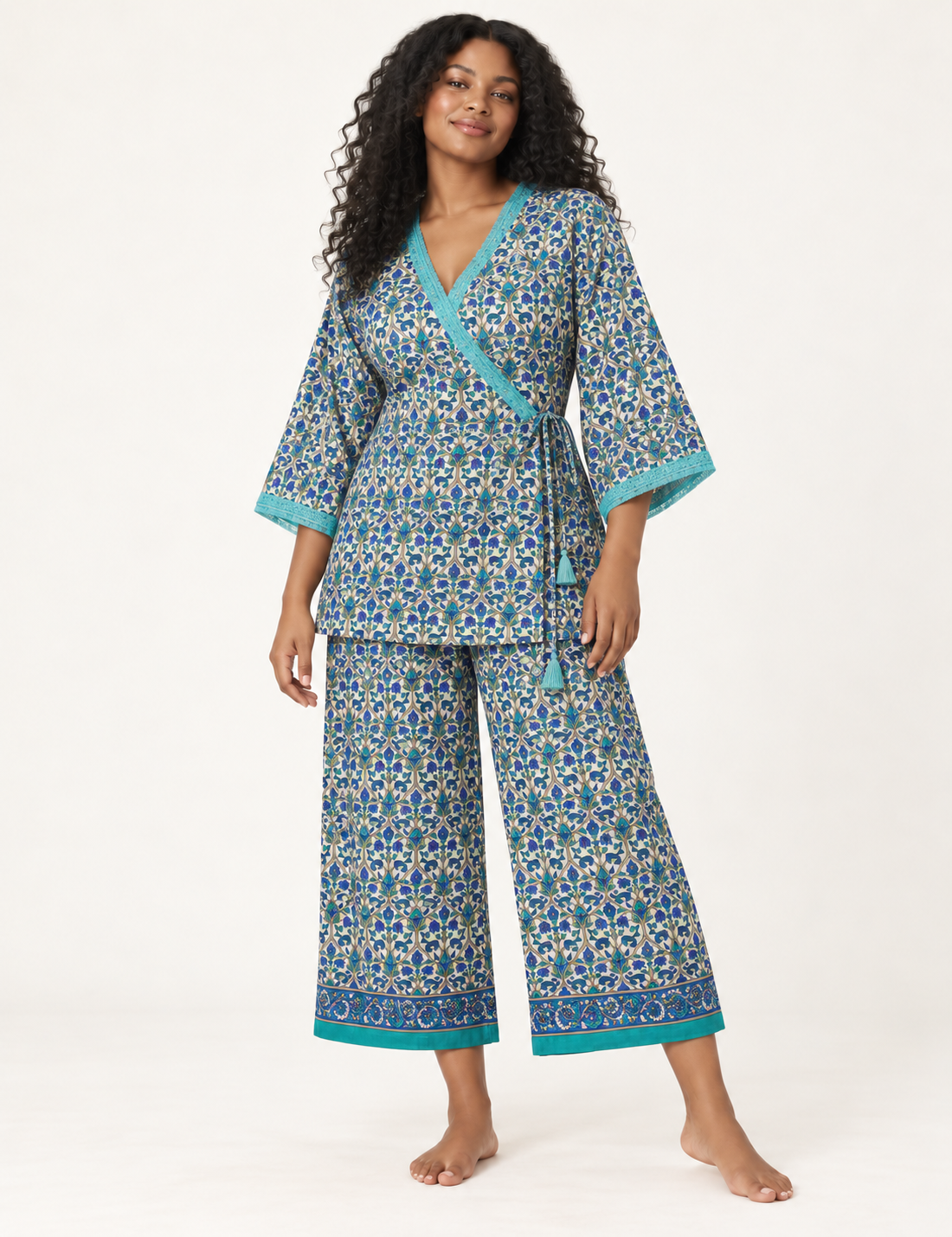 Pink tunic set with micro leaf pattern, turquoise trim on neckline and sleeves, and matching wide-leg pants with border print