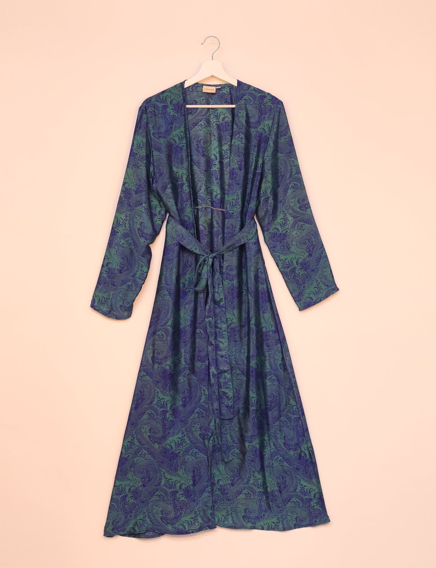 Beach robe made from upcycled saris, embodying ethical and sustainable fashion principles. Perfect for eco-conscious beachgoers and mindful living enthusiasts.